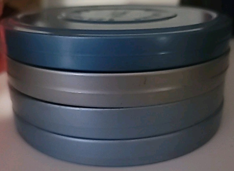 4 METAL SUPER 8 REELS WITH TINS HERALD SQUARE MACY’S W.T. GRANT B GERTZ COMPCO