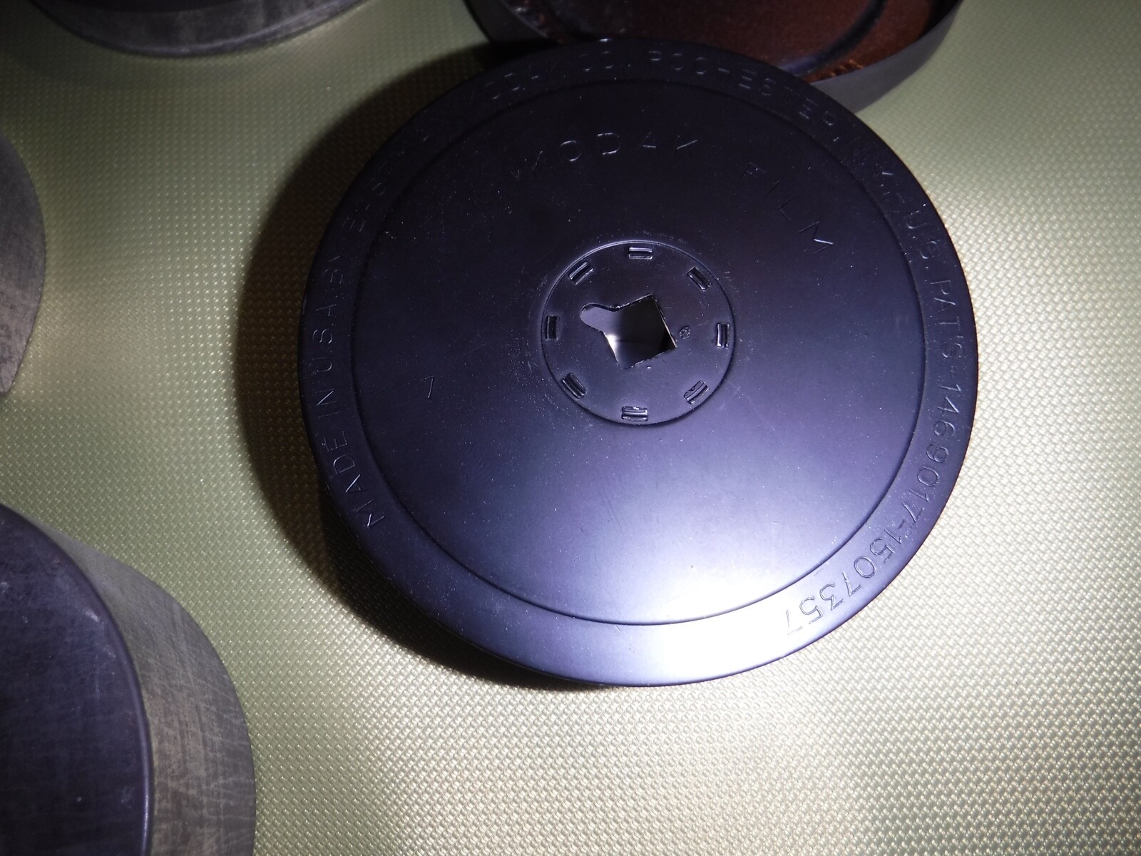 EASTMAN KODAK CO 2 VINTAGE TINS CONTAINERS AND 1 METAL REEL