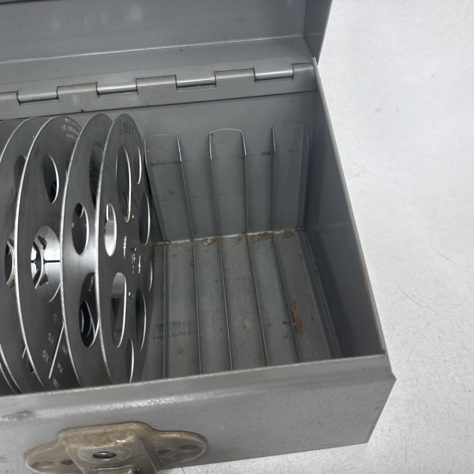 Brumberger Reel/Reel Metal Storage Case With 12 Empty Canisters