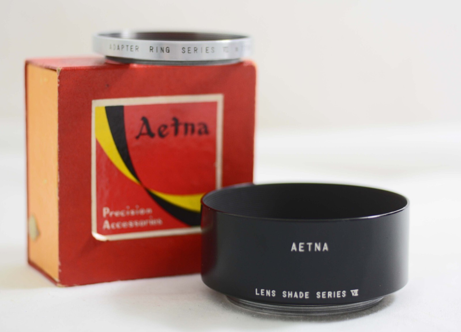 VINTAGE AETNA SERIES VII METAL CAMERA LENSHOOD WITH 49MM ADAPTER RING (MINT)
