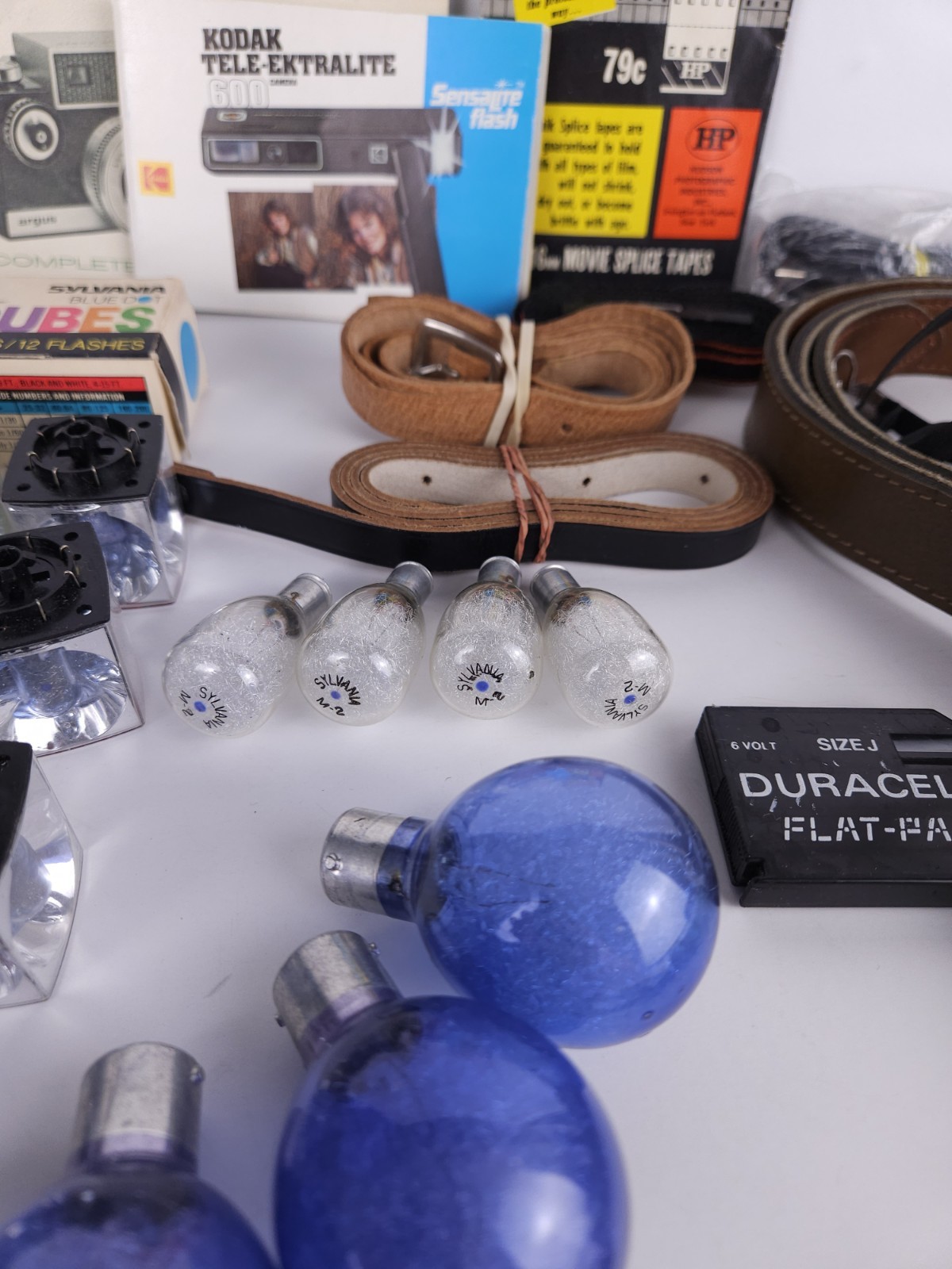 Junk Drawer Lot Of Vintage Camera Camcorder Parts – Bulbs Straps Tapes Manuals