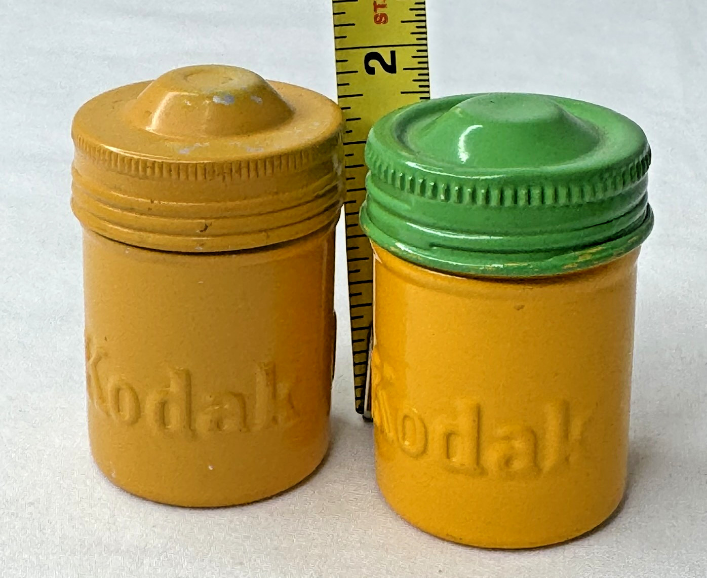 Lot of VTG 2 Kodak Empty Green Yellow Metal 35mm Canisters & PLUS-X PX 135 Film