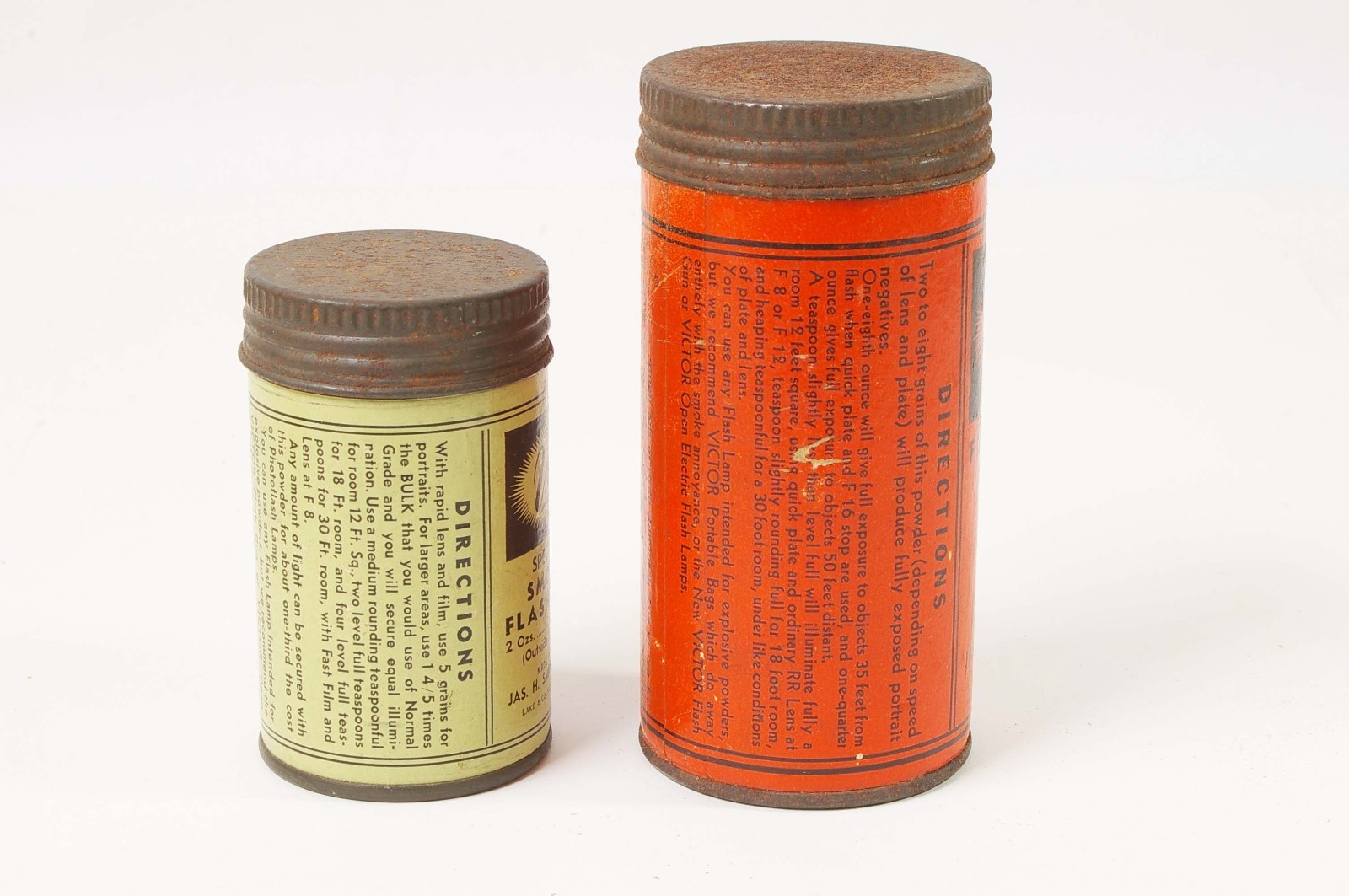 F97917~ Two Victor Flash Powder Cans With Bottles – Empty – J.H. Smith & Sons