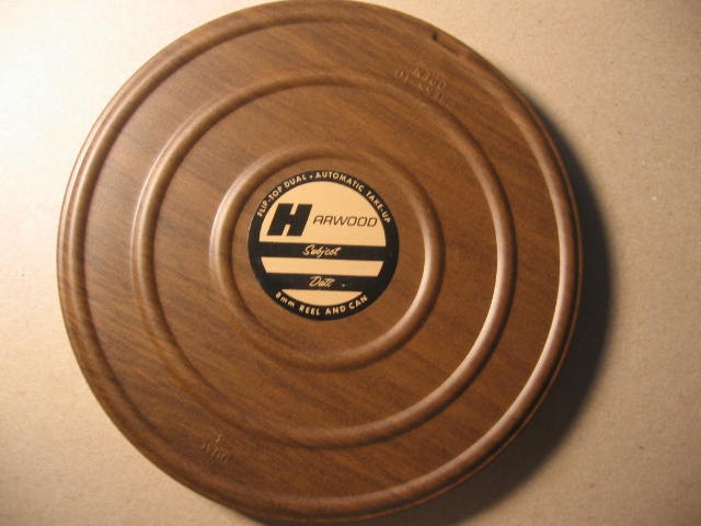 vintage Harwood 8mm reel & can 7″