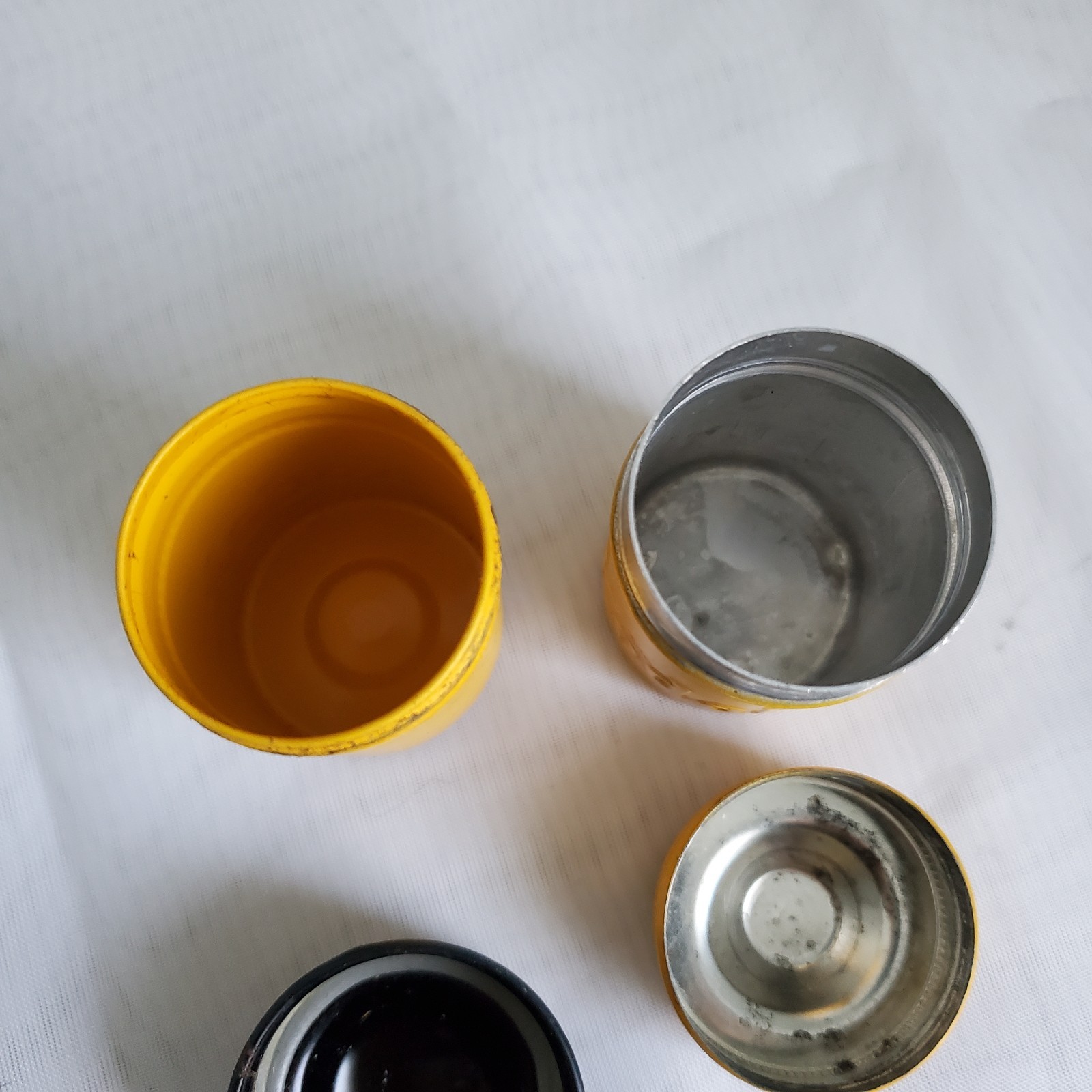 Lot of 2 Kodak Black Yellow Embossed Metal Film Roll Containers