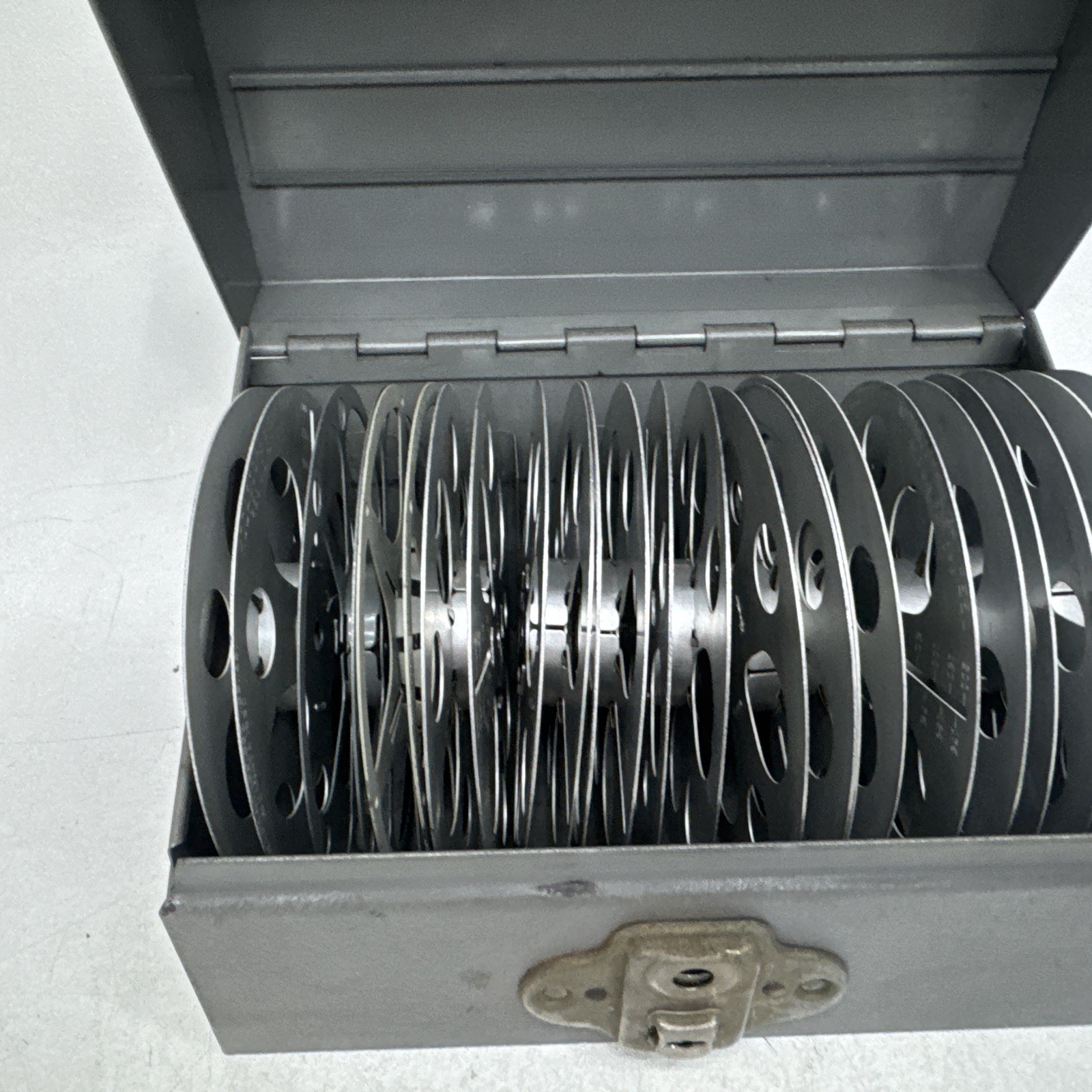 Brumberger Reel/Reel Metal Storage Case With 12 Empty Canisters