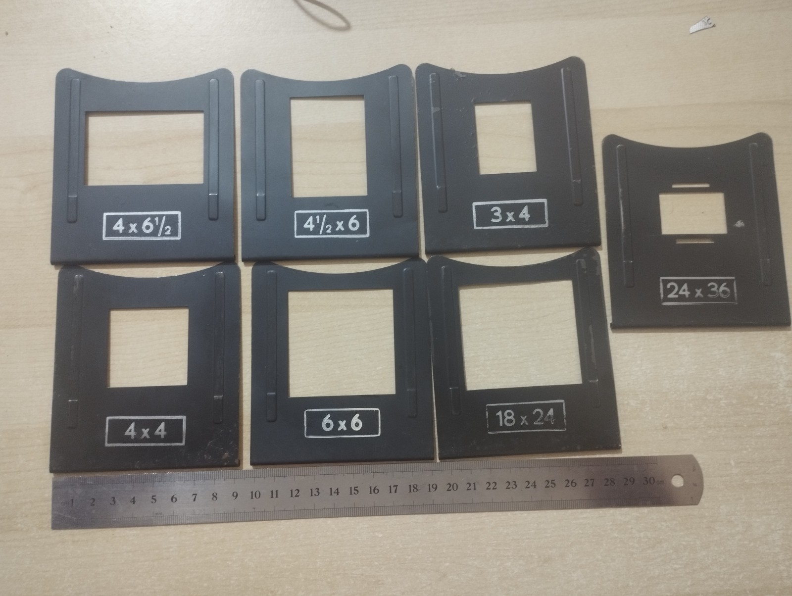 7 frames / masks in different sizes – see pictures. Used.