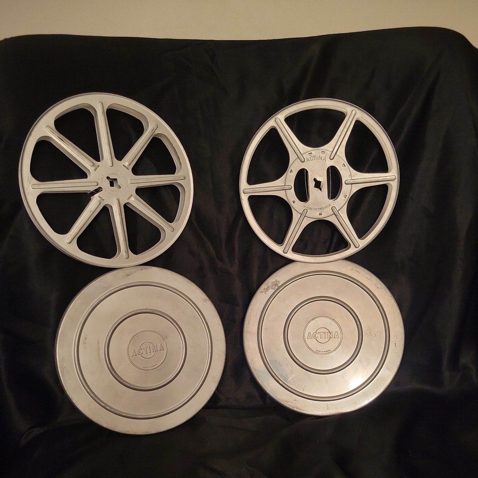 Vintage ACTINA Aluminum Movie 7″ Reels And Canisters. Lot Of 2.