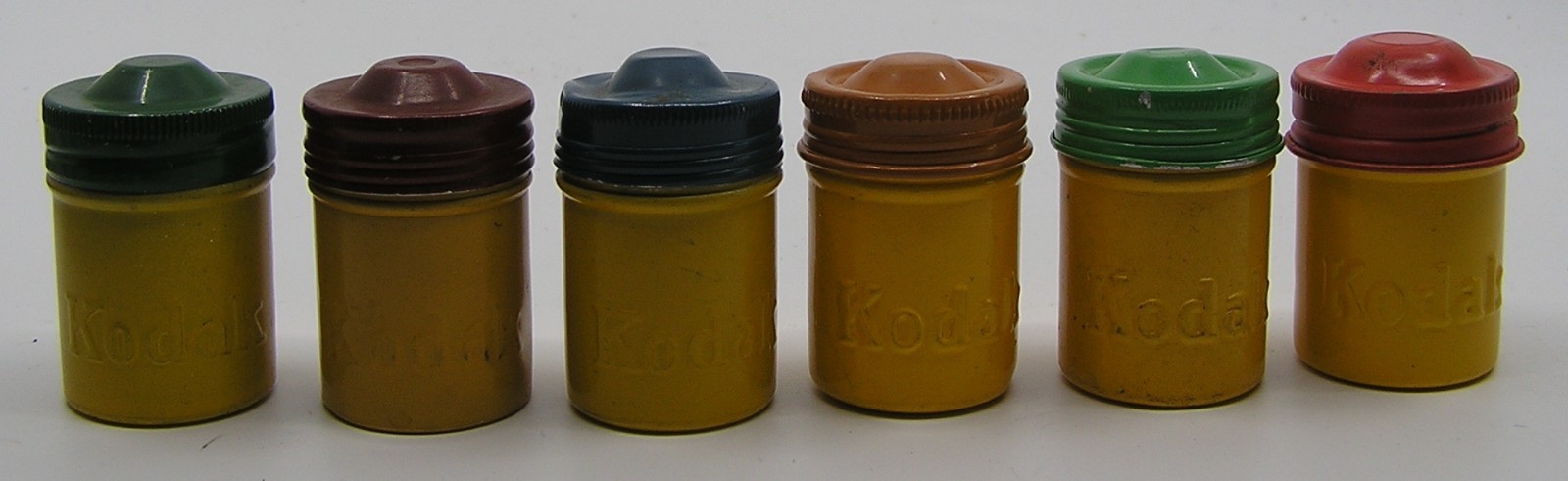 10 Vintage Kodak Embossed 35 MM Metal Tin Film Empty Canisters & 4 Films