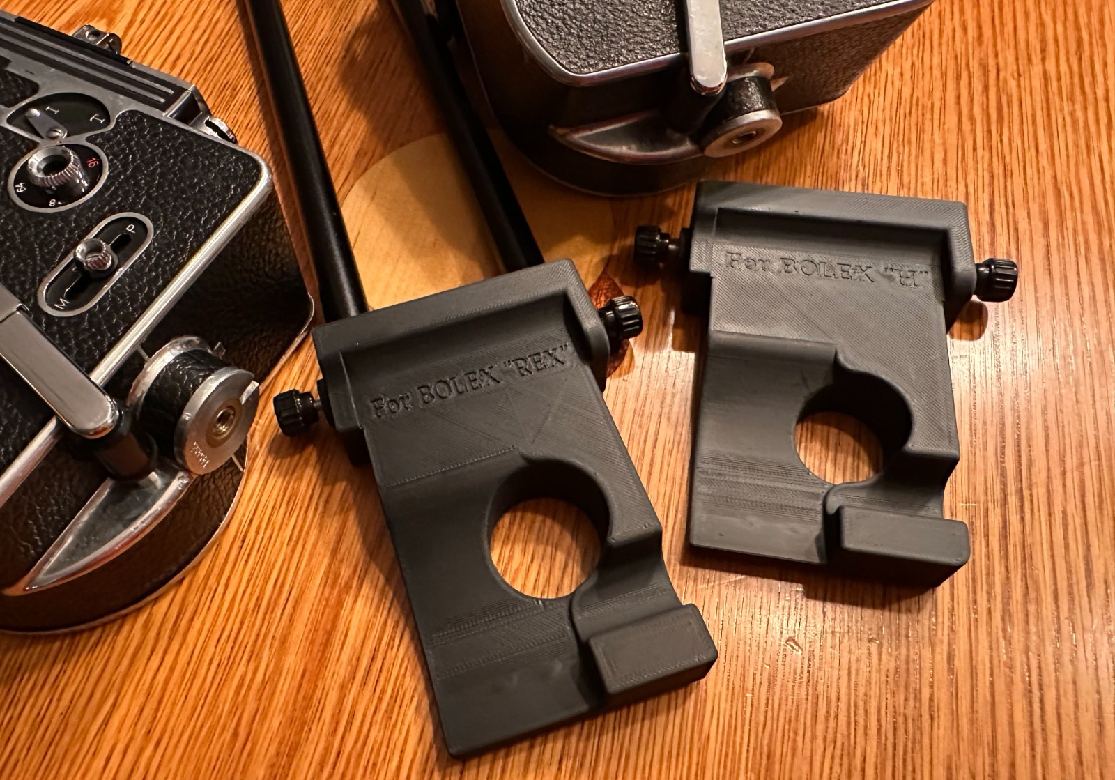 Bolex Saddle for 15mm Rods 60mm on Center – for “REX1 2 or 3” Round Base Cameras