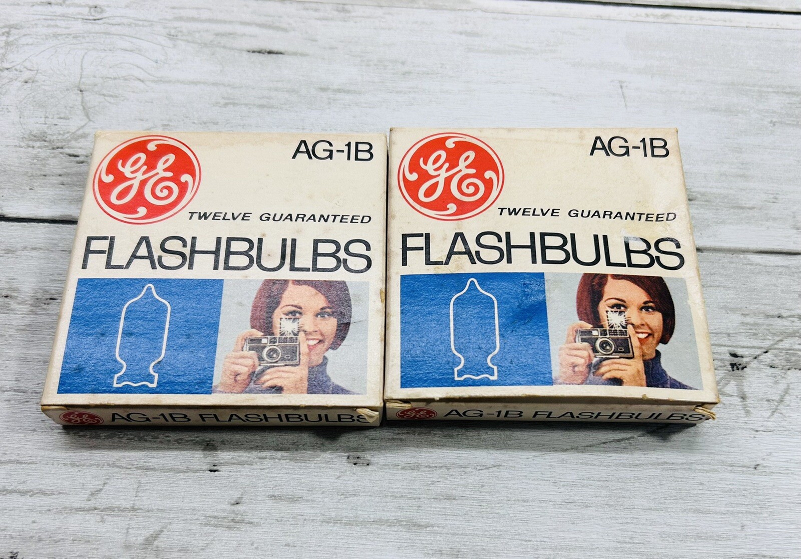 NOS 12 pack GE Blue Dot AG-1B Vintage Flash Bulbs 2 Boxes 23 Bulbs In Total.