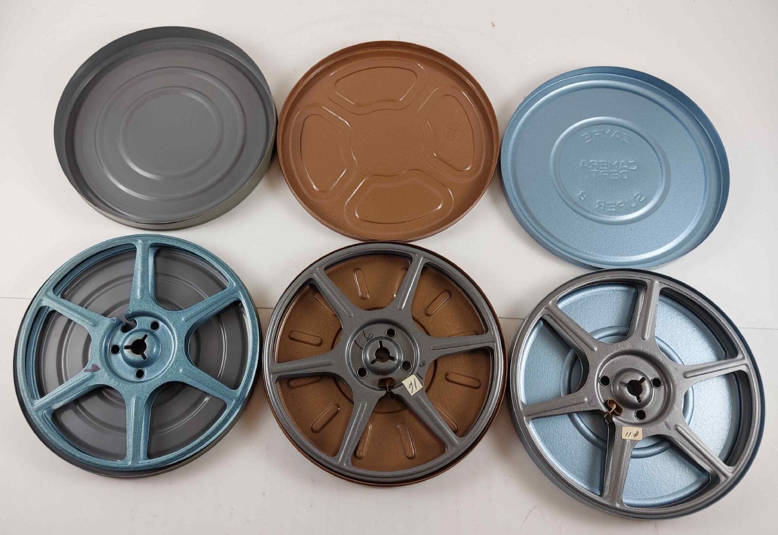 3 8MM FILM CANISTERS & REELS 5″ – GB & ZAYRE
