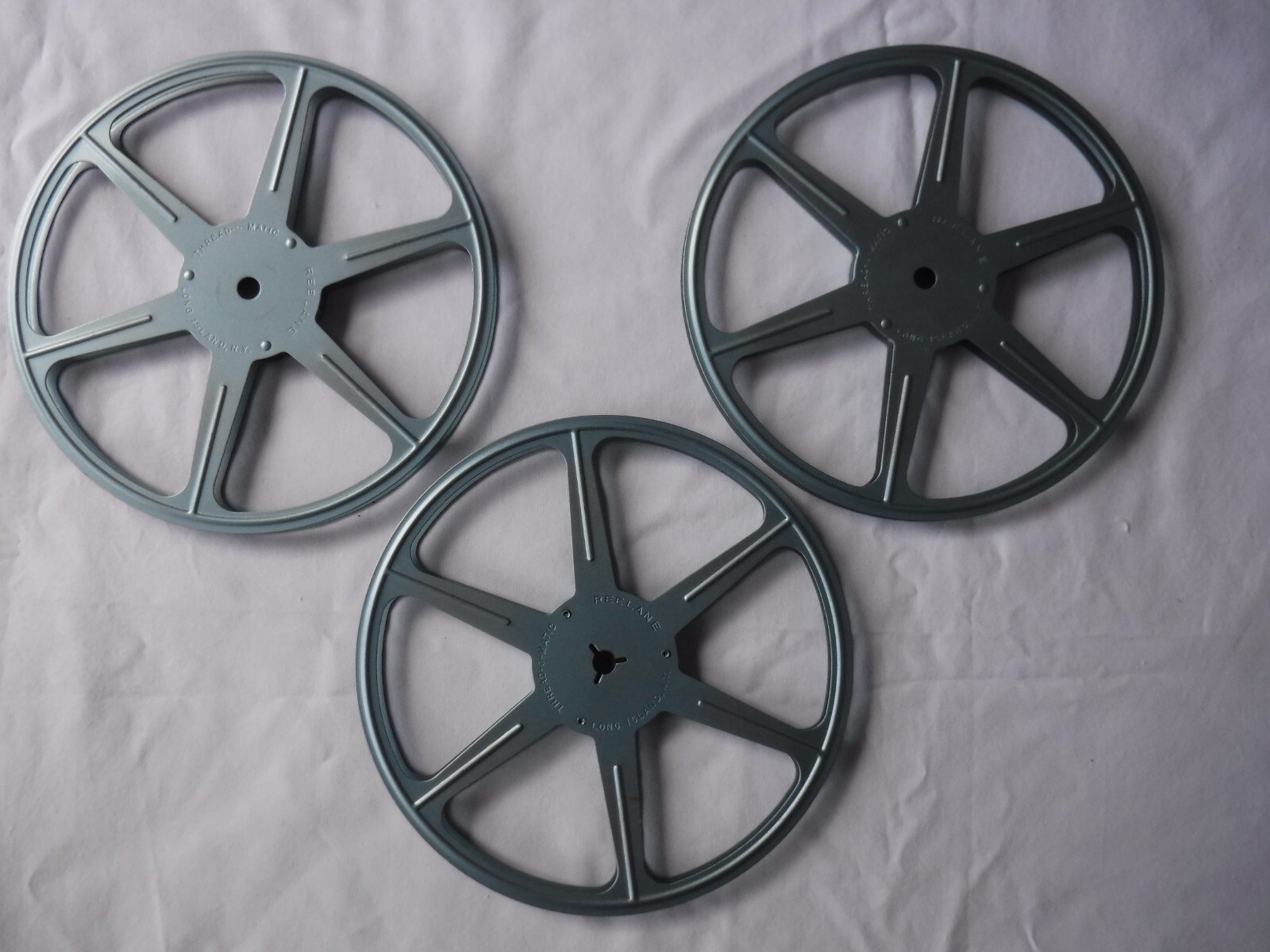 3 Vintage Metal Film Movie Canisters Reels 7″ Broadway NY Tin Green Tins 8mm