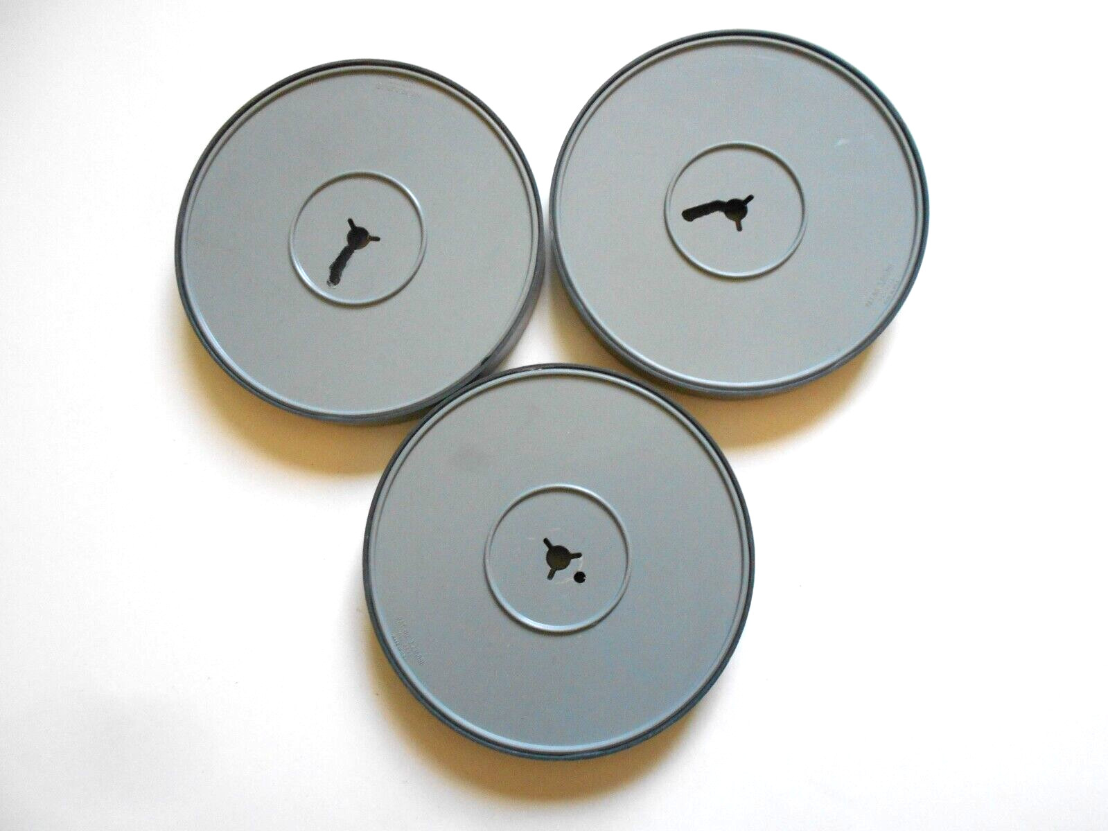 3 – Unbranded Regular 8mm 200 ft. Gray Plastic reels in case