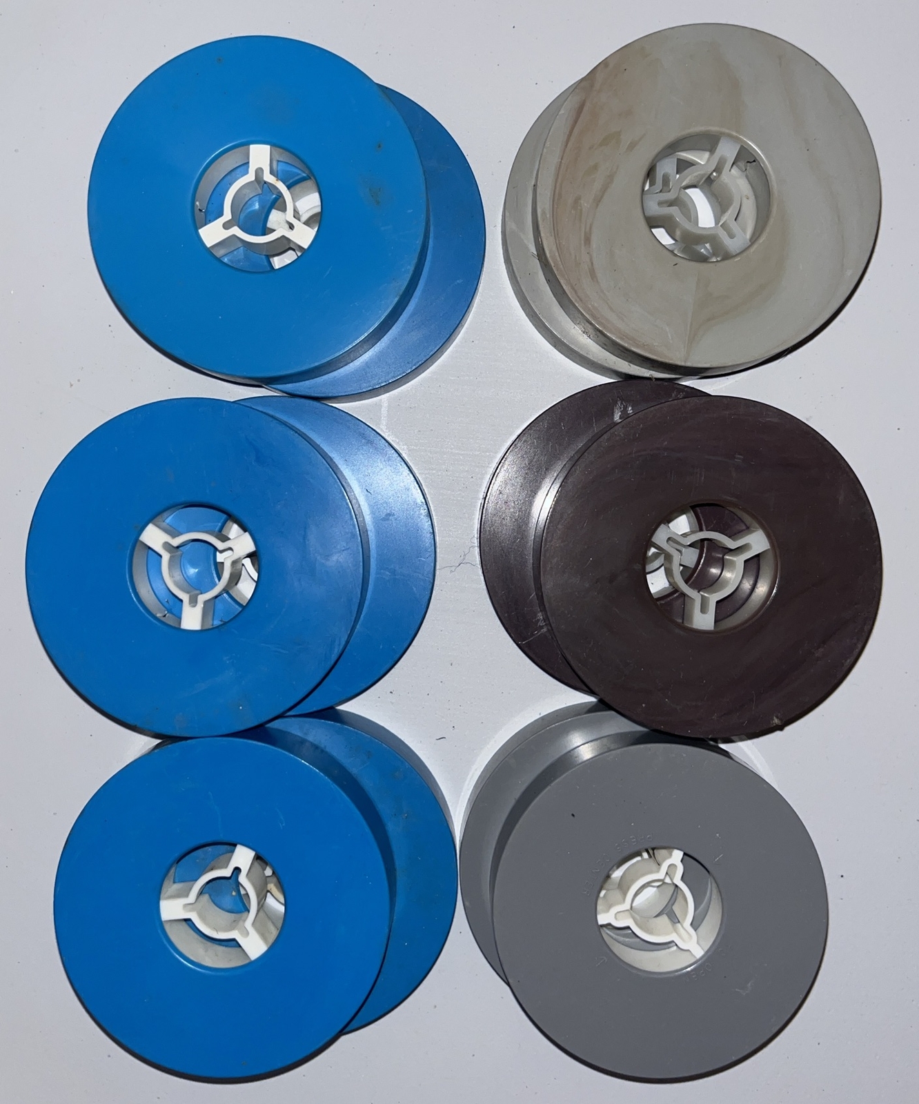 (12) 8mm Film Reels In Their Cases