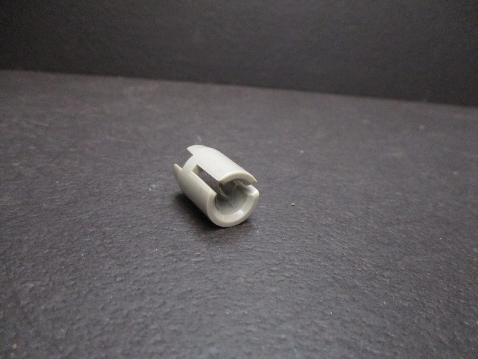 Adapter for a dual 8 movie projector to accept a Super 8 reel.