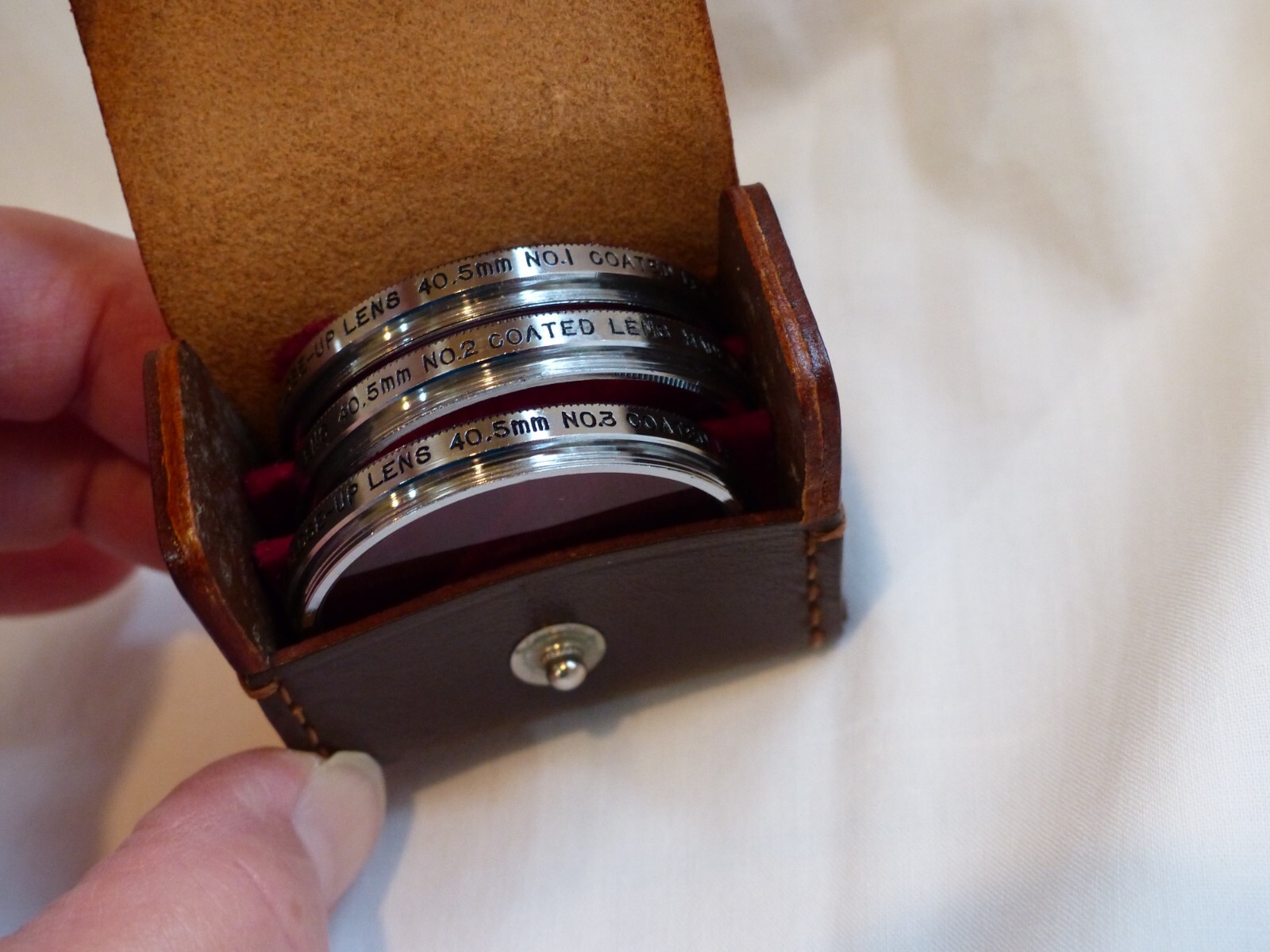 Vintage Vemar 40.5 mm closeup filters in leather case, No. 1, 2, and 3