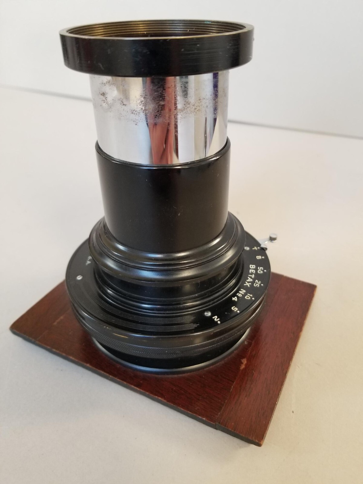 Vintage Wollensak Betax No. 4 Barrel with shutter on 5″ x 3 3/4″ board. Read!