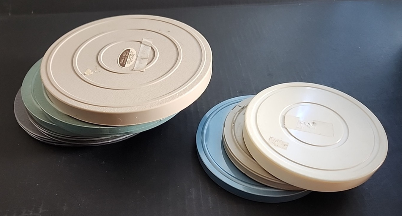8 Lot Including Five 7″ Canisters for 8mm Film & 3 other various canisters/reels