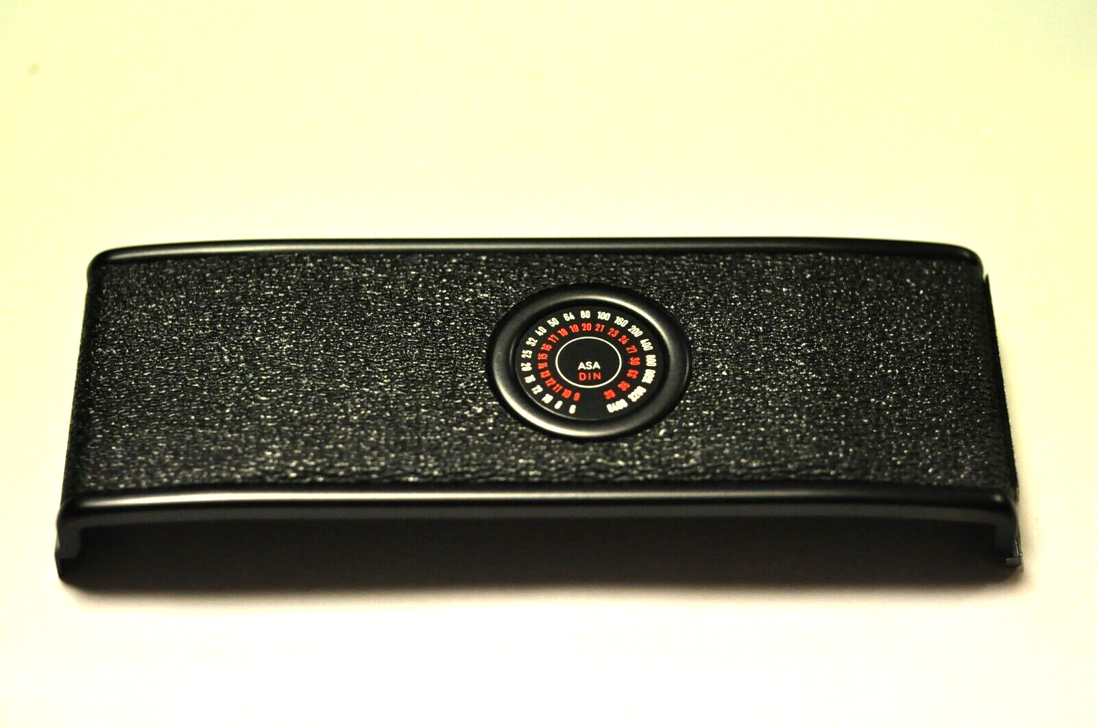 Minolta replacement back door for their SRT SLR camera. NOS