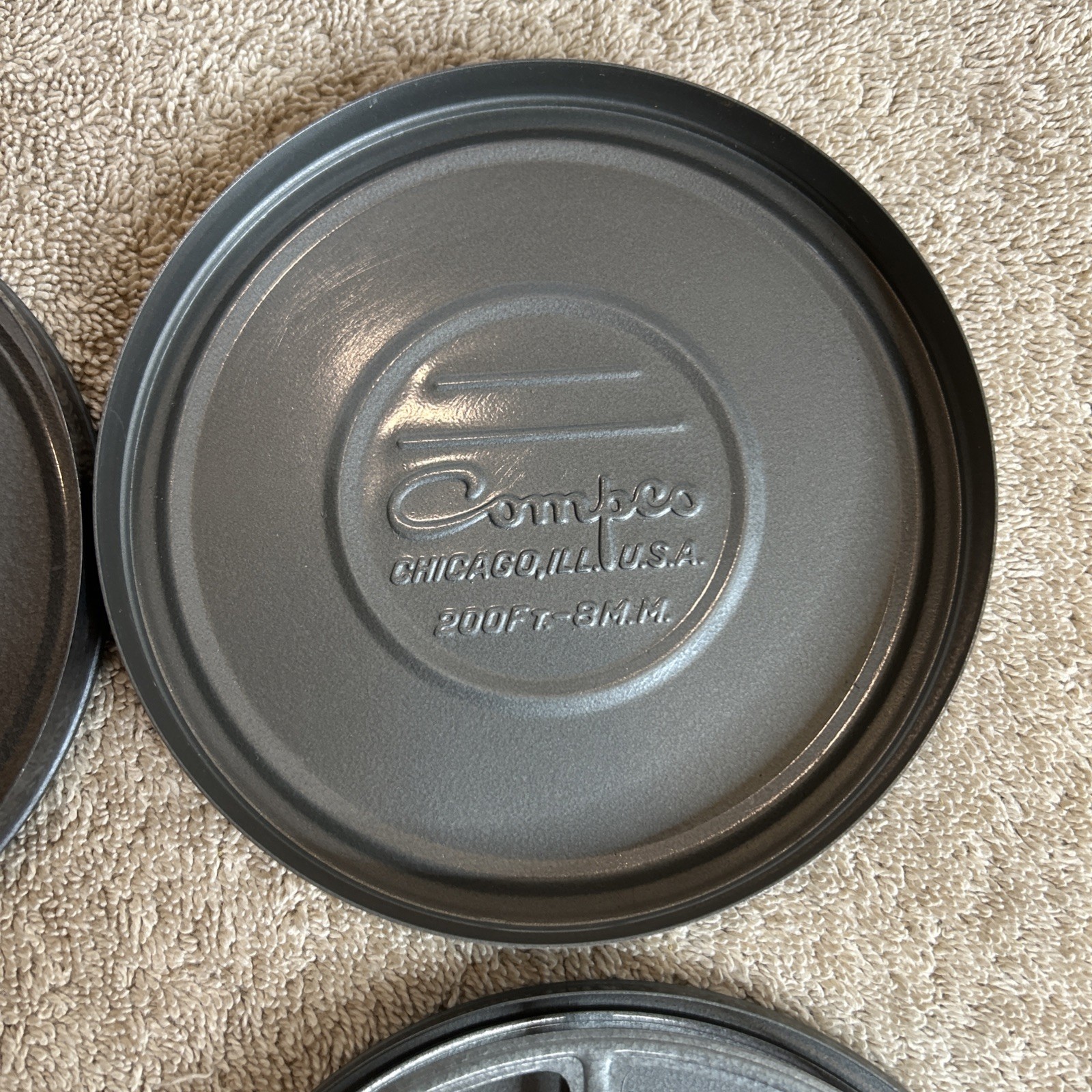 Two Vintage Compco Film Canisters And Reels. Two Different Grey Colors 100-R04