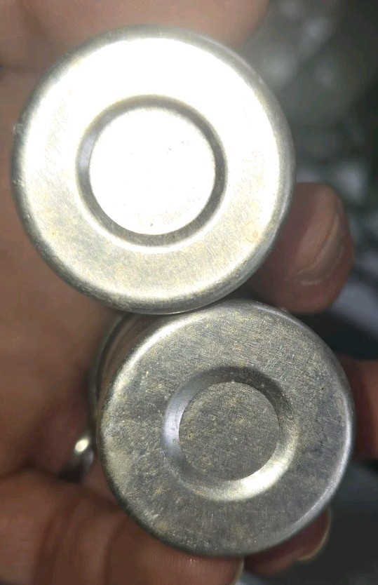 2 vintage aluminum film canisters
