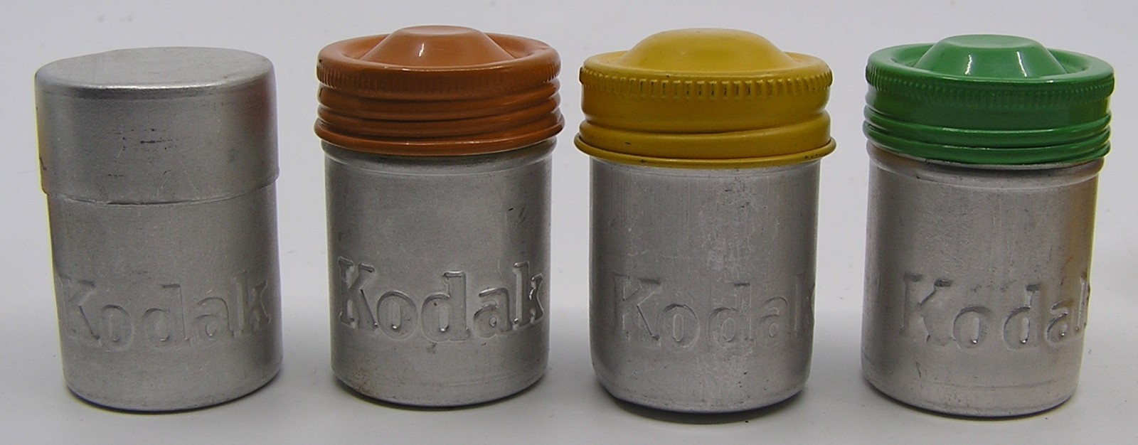 10 Vintage Kodak Embossed 35 MM Metal Tin Film Empty Canisters & 4 Films