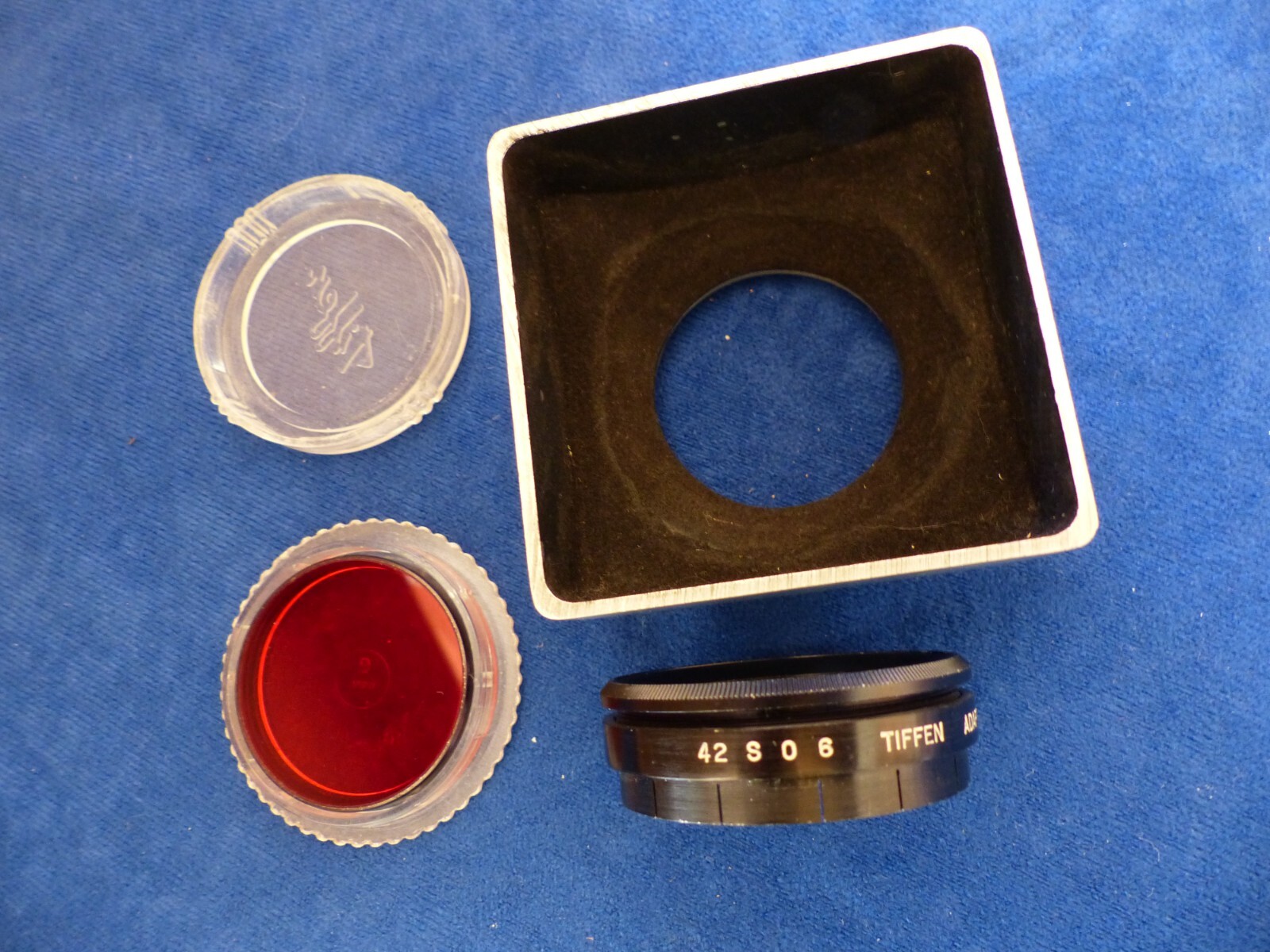 Tiffen square lens shade and 44 mm push-on adapter and red 1 filter in case