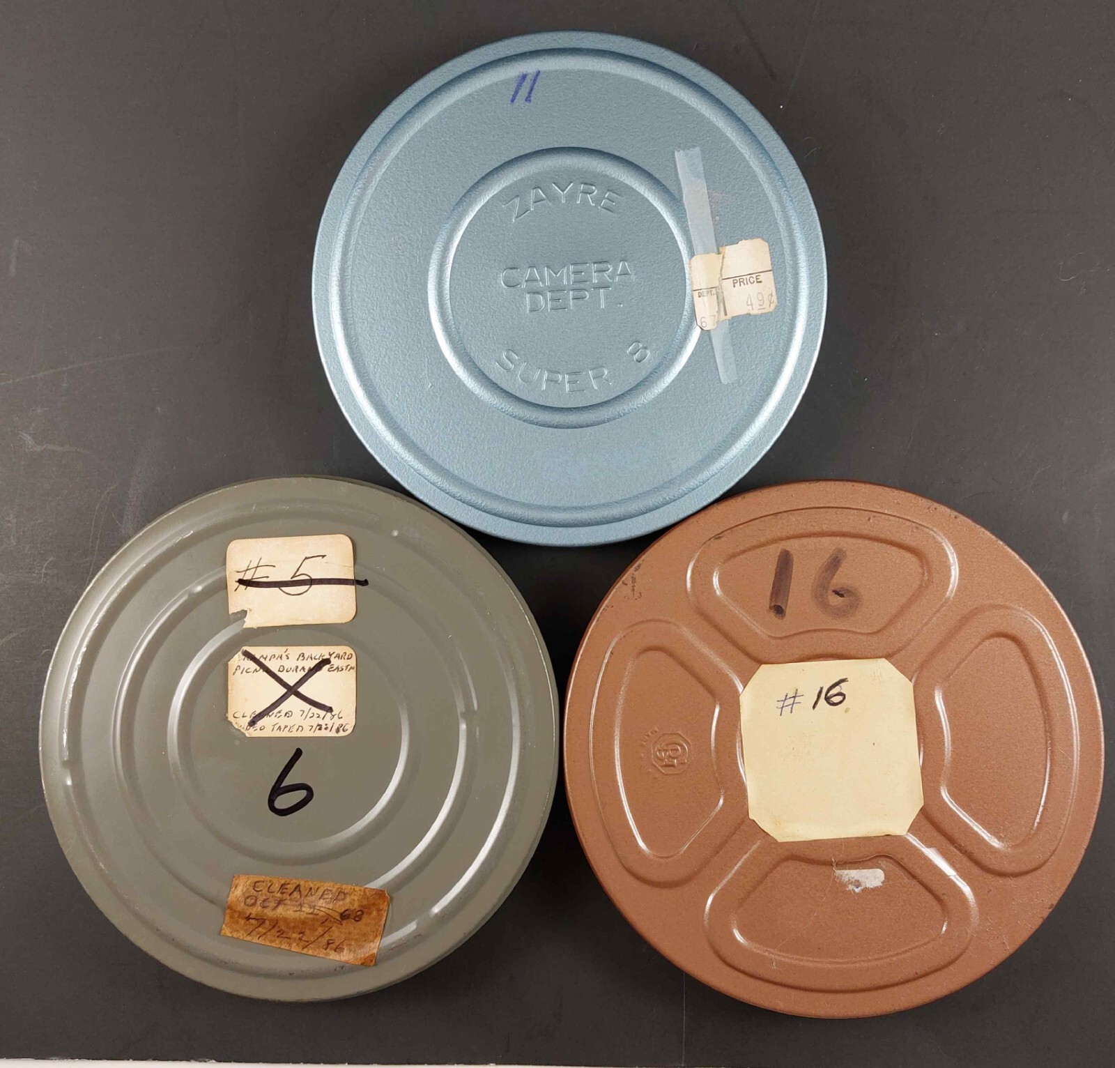 3 8MM FILM CANISTERS & REELS 5″ – GB & ZAYRE