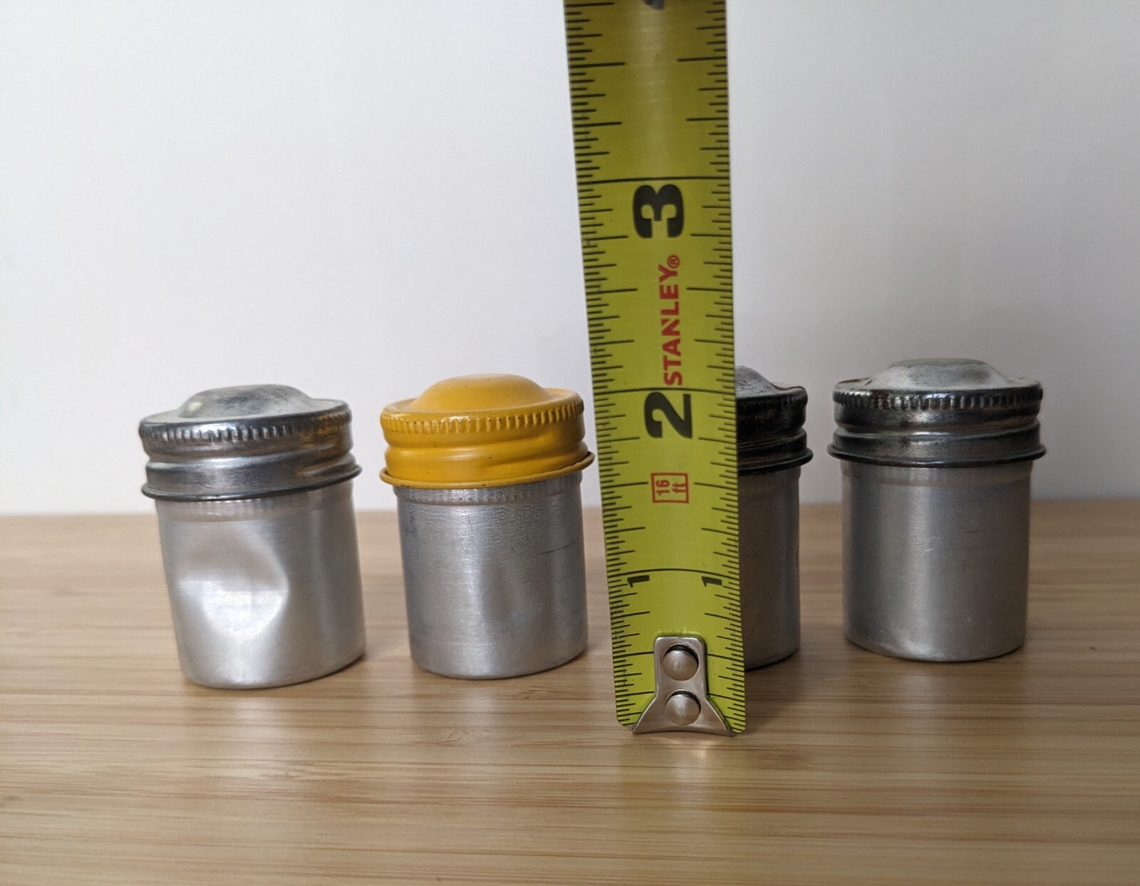 Four Vintage 35mm aluminum film canisters unbranded W/ metal top
