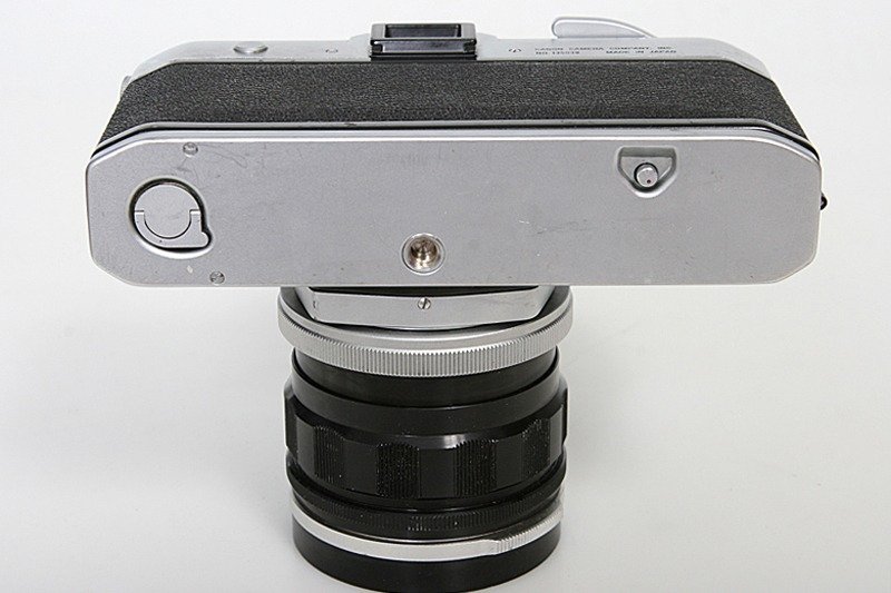 Canon Pellix 35mm SLR Camera With Canon FL 35mm f2.5 Lens