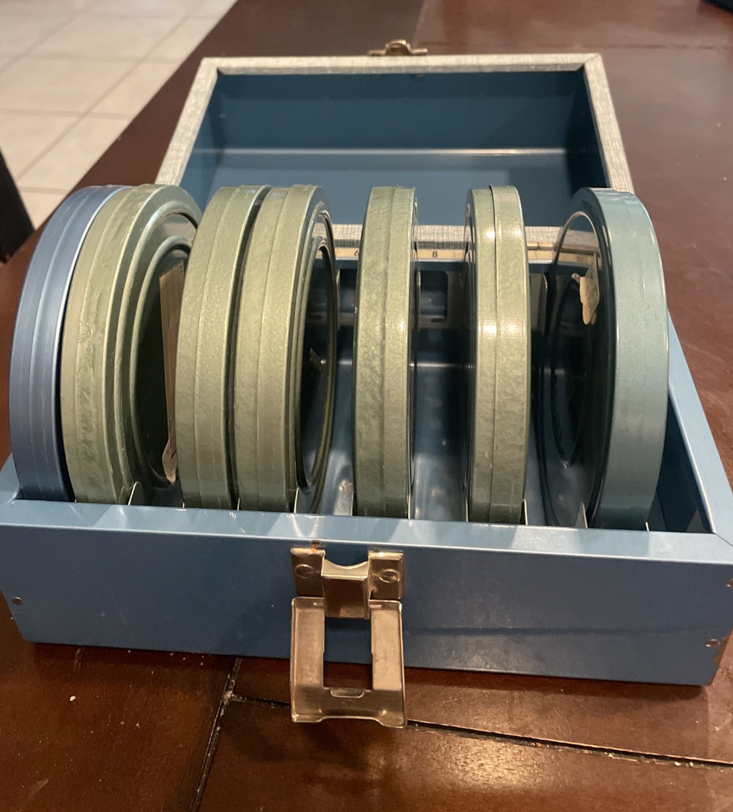 7 Vintage 5″ Metal Regular 8mm Movie Reels in Metal Cases with Metal Carry Case
