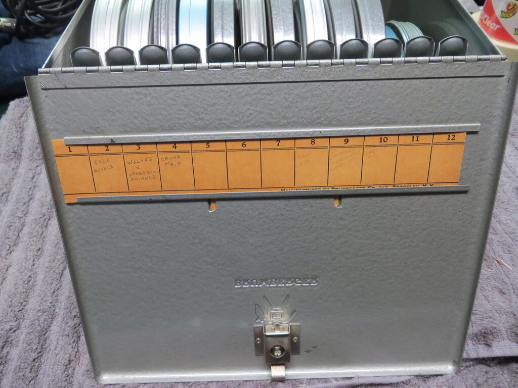 Brumberger 8mm reel case W/ 12 mint take up reels & vintage films