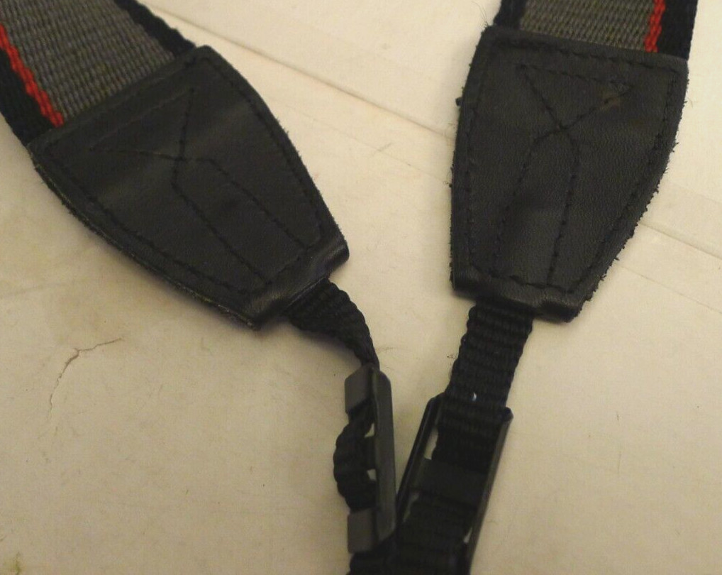 Nikon 1 1/2″ Wide Camera Neck Strap – Grey w/Red Stripe Yellow Logo -Gently Used