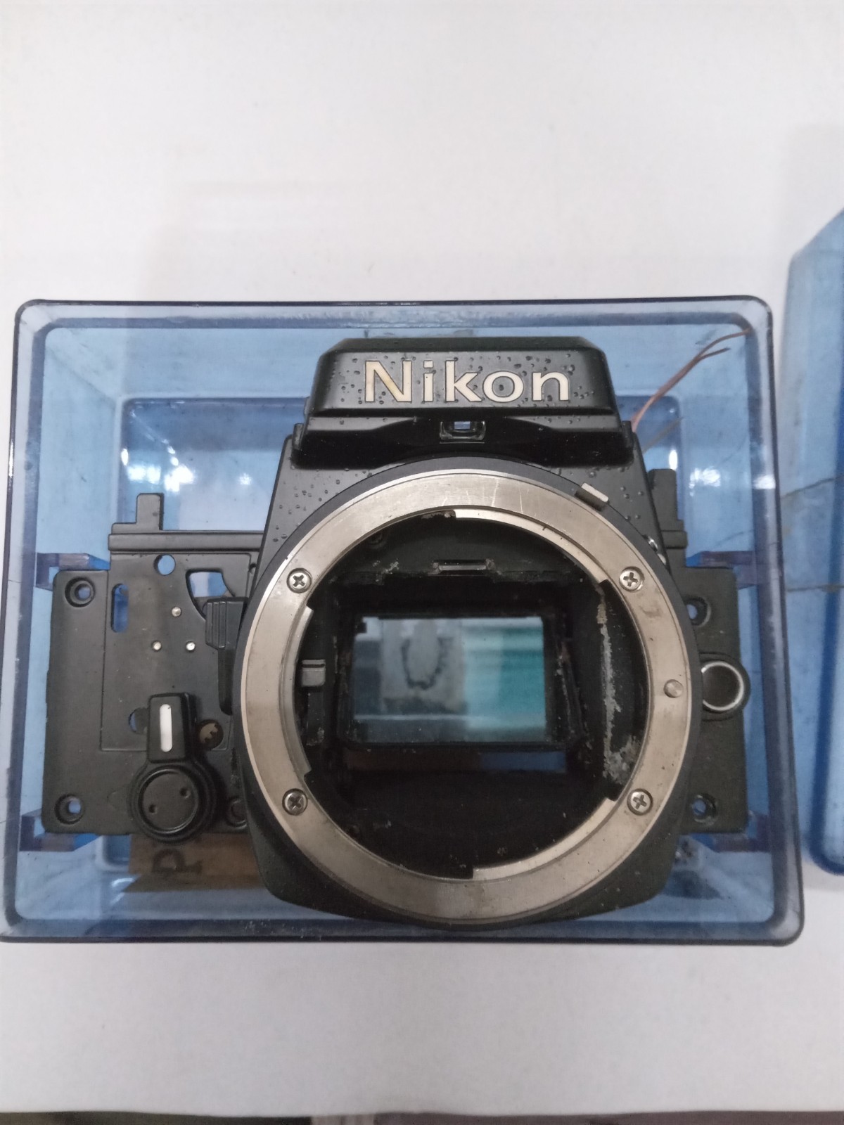 New Old Stock Black Nikon FE Front Bezel W Mirror Spare Part