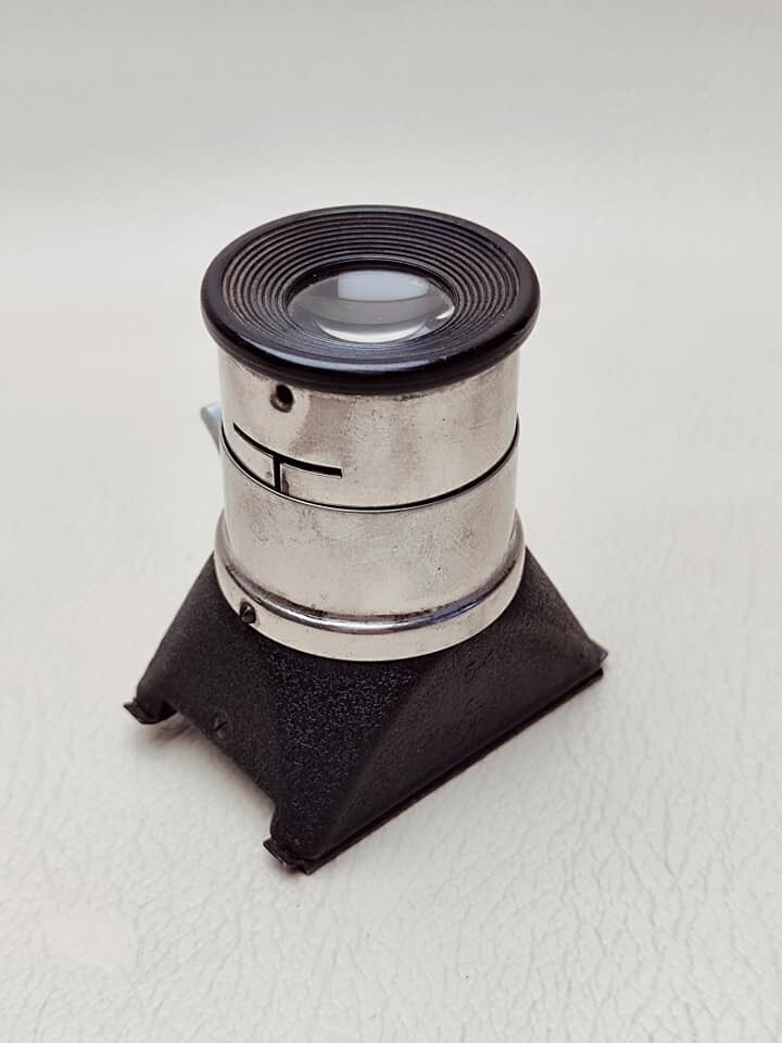 Magnifying glass for viewing 35 mm film photo, made in USSR