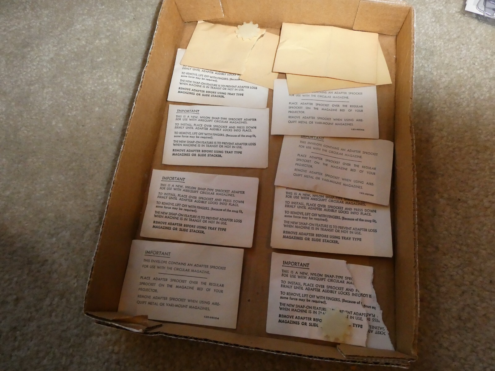 Lot of 11 Vintage Airequipt Circular Magazines Snap Type Sprocket Adapters NOS