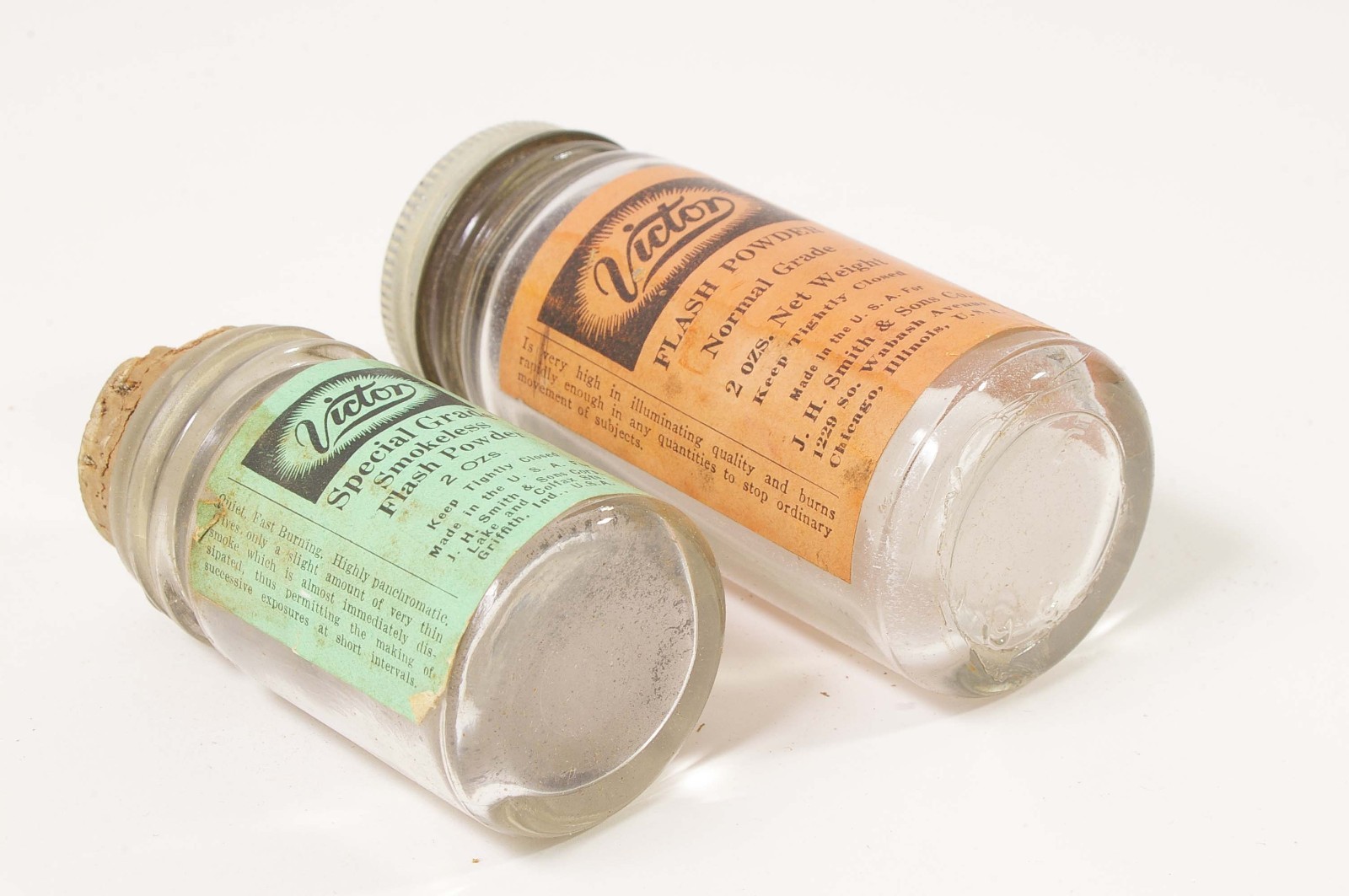 F97917~ Two Victor Flash Powder Cans With Bottles – Empty – J.H. Smith & Sons