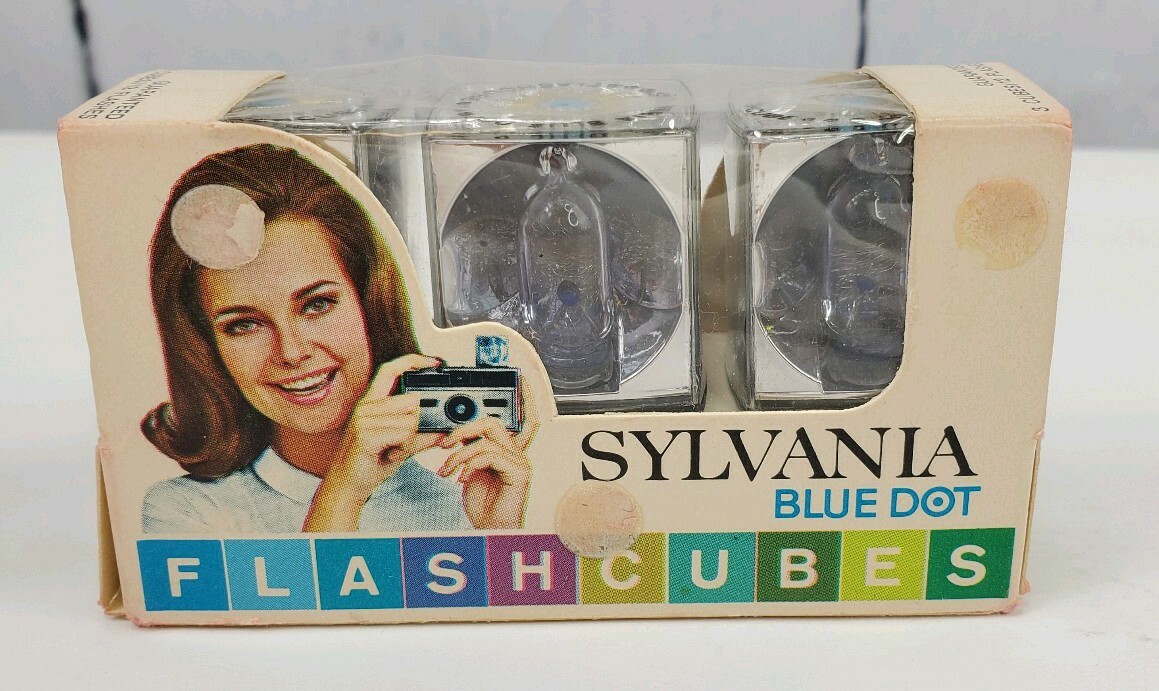 4 Camera Flash Cubes, 3 Boxes of Sylvania Blue Dot, 1 Box of Norelco NOS Bulbs