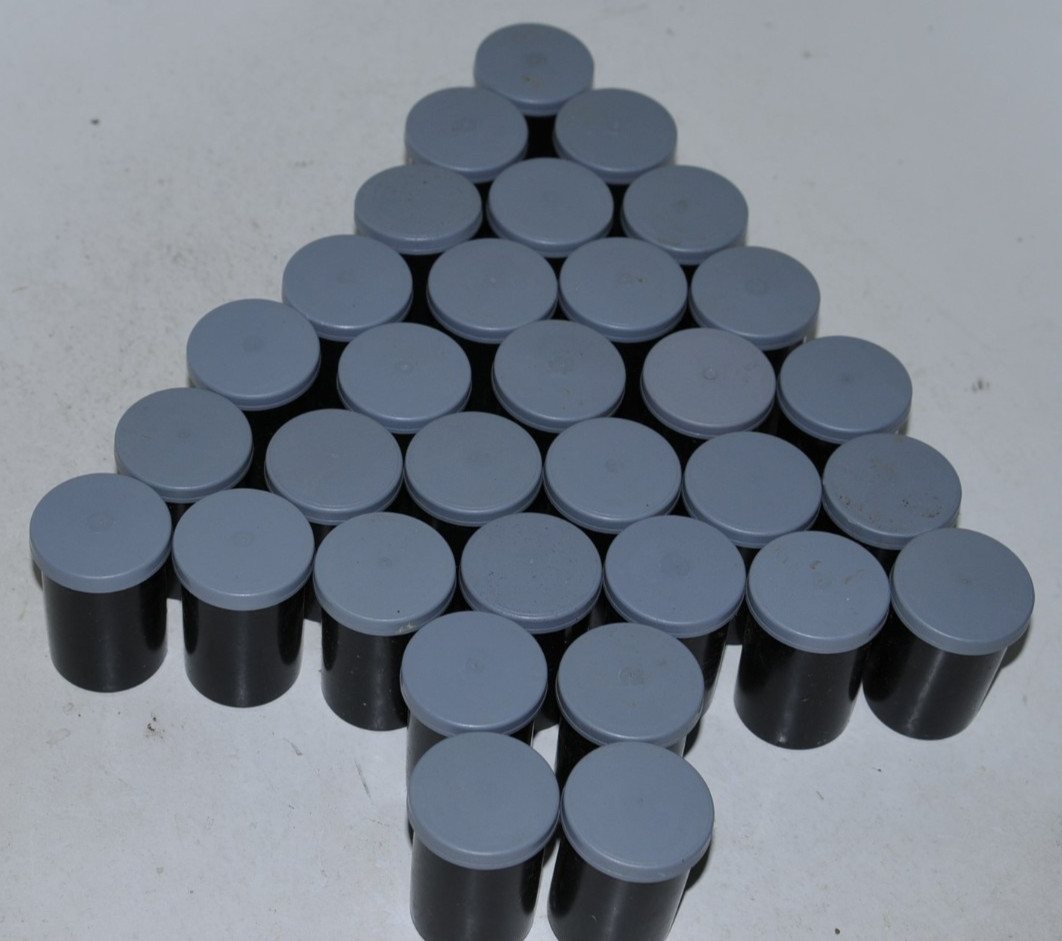 32 Kodak black plastic 35mm film canisters w/ gray caps #15