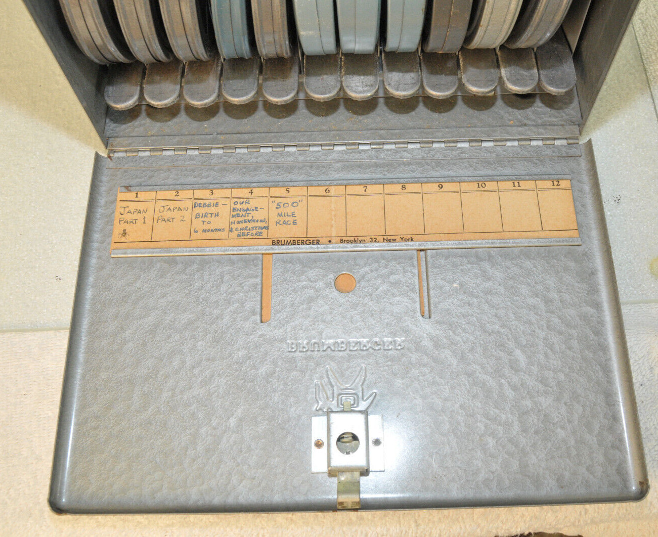 BRUMBERGER 12 Film Reel Canister Metal Storage Box Circa 1950s UNIQUE DISPENSER
