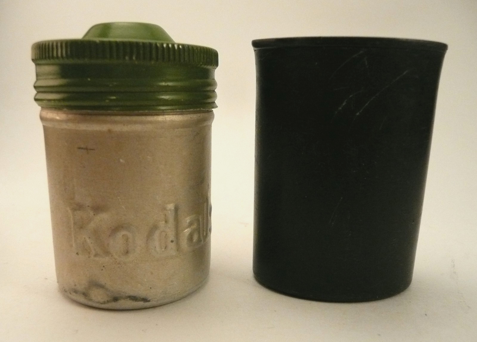 Vintage Kodak Film Canisters Green Metal and Black Plastic Set Of 2