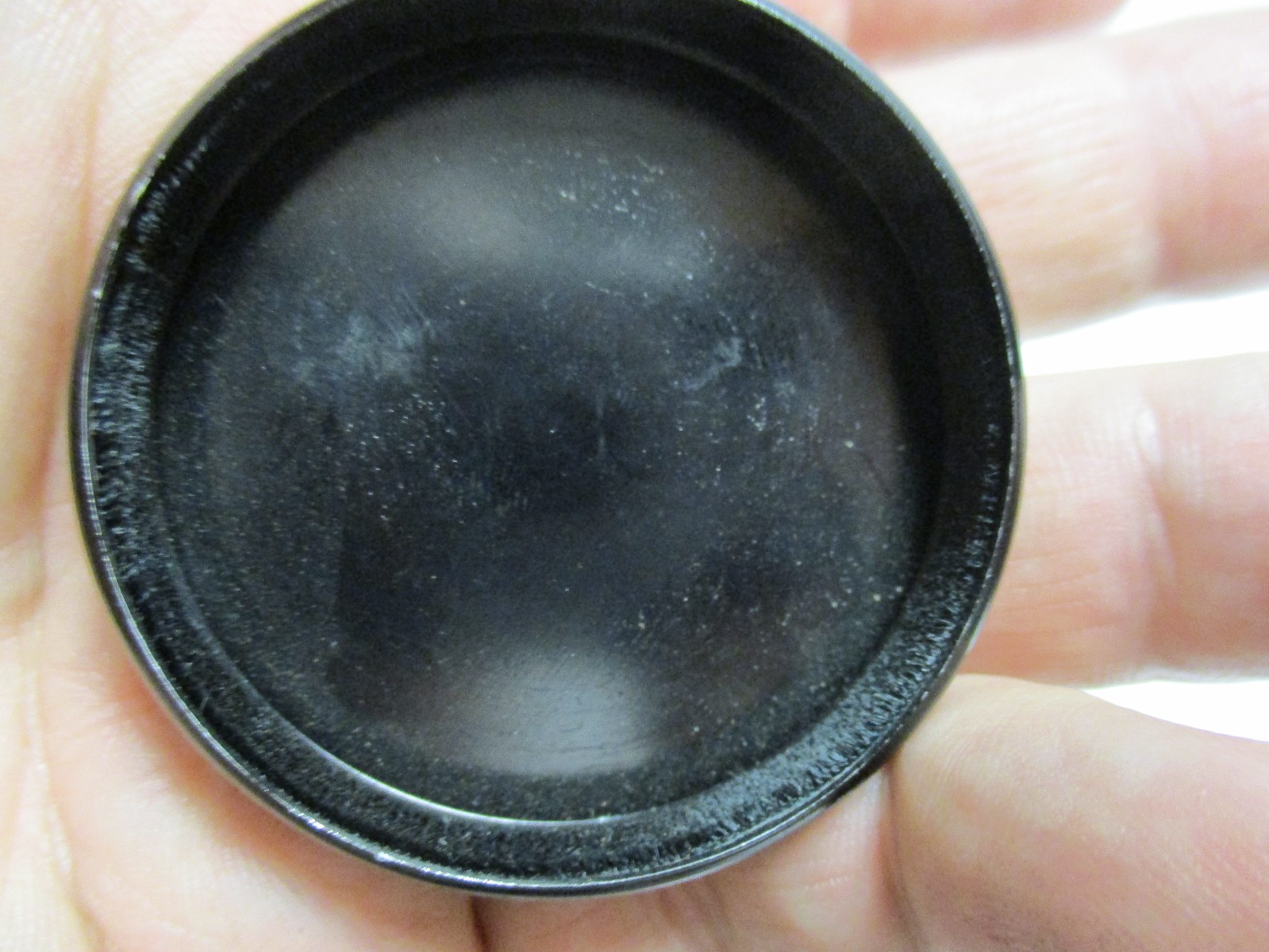 Ricoh black metal push on lens cap. Looks to be inside dia. of 43mm.
