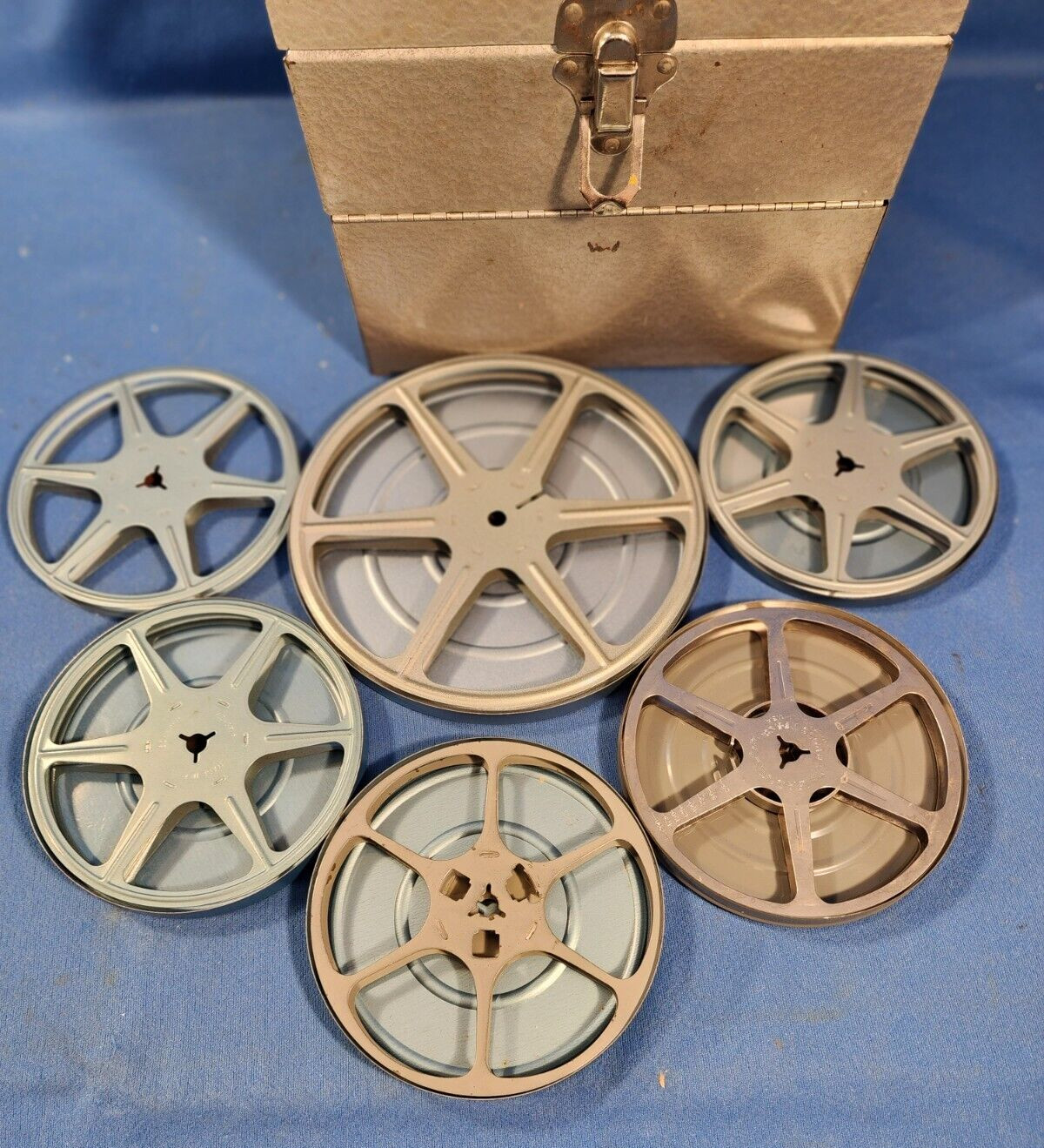 VINTAGE FILM CANS, REELS & LOGAN 12 SLOT CHEST – BLUE GRAY COLOR
