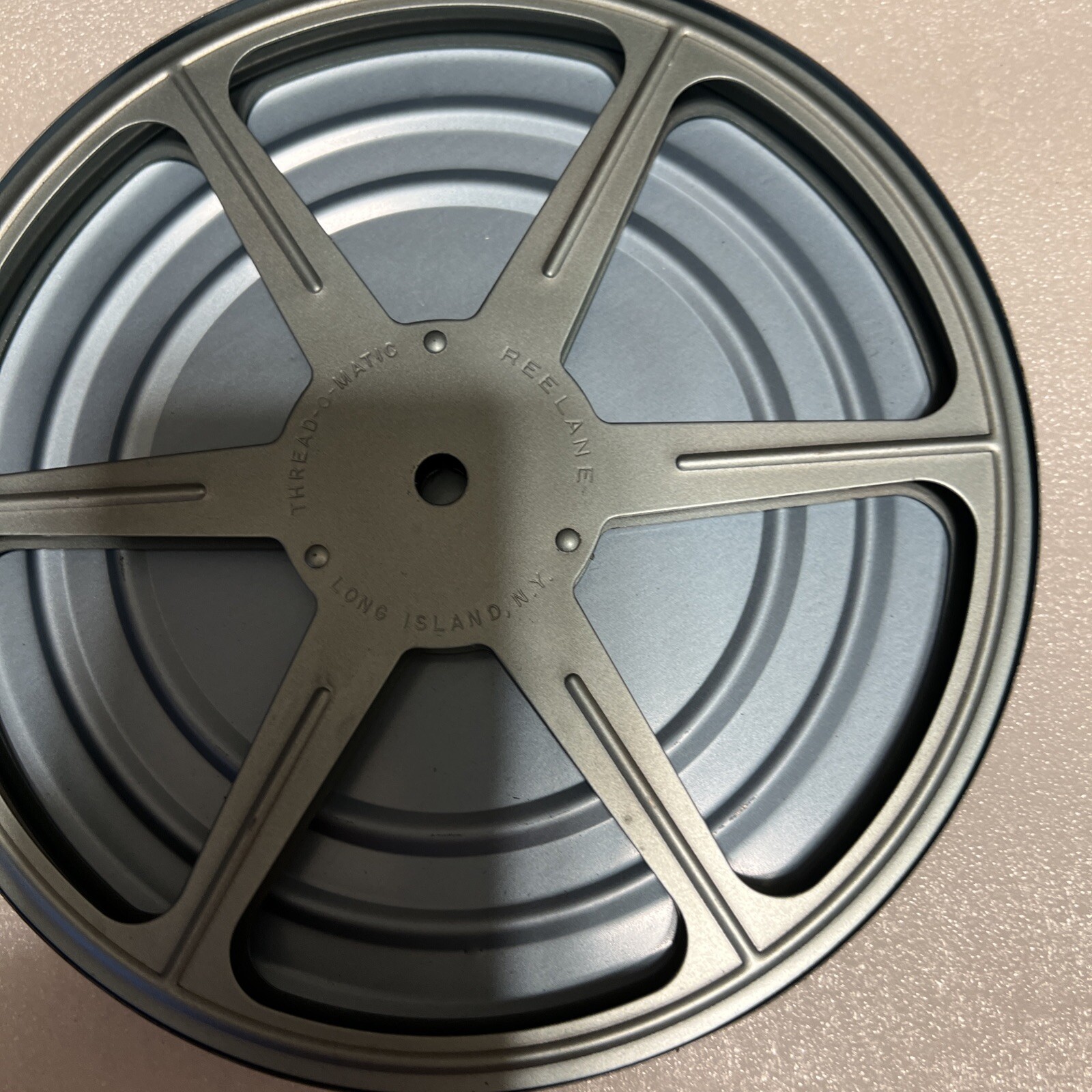 Reelane Thread-O-Matic 7” Film Reel with Canister Lot