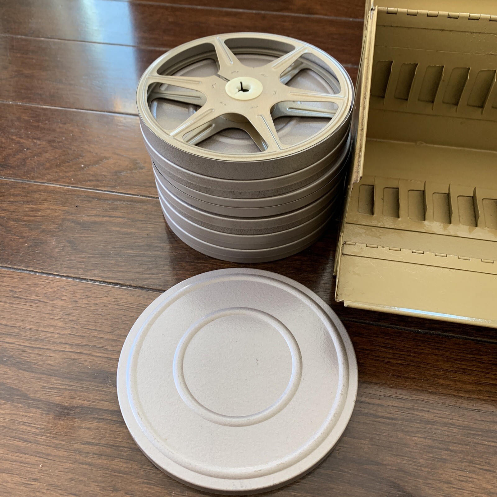 Vintage 8mm Film Set With 12 Slot Metal Case And Reels In Very Good Condition.