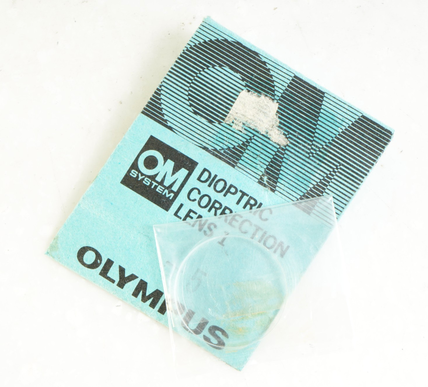 – OLYMPUS OM SYSTEM DIOPTRIC CORRECTION LENS 1 (-5) FOR OM-1(N), OM-2(N)