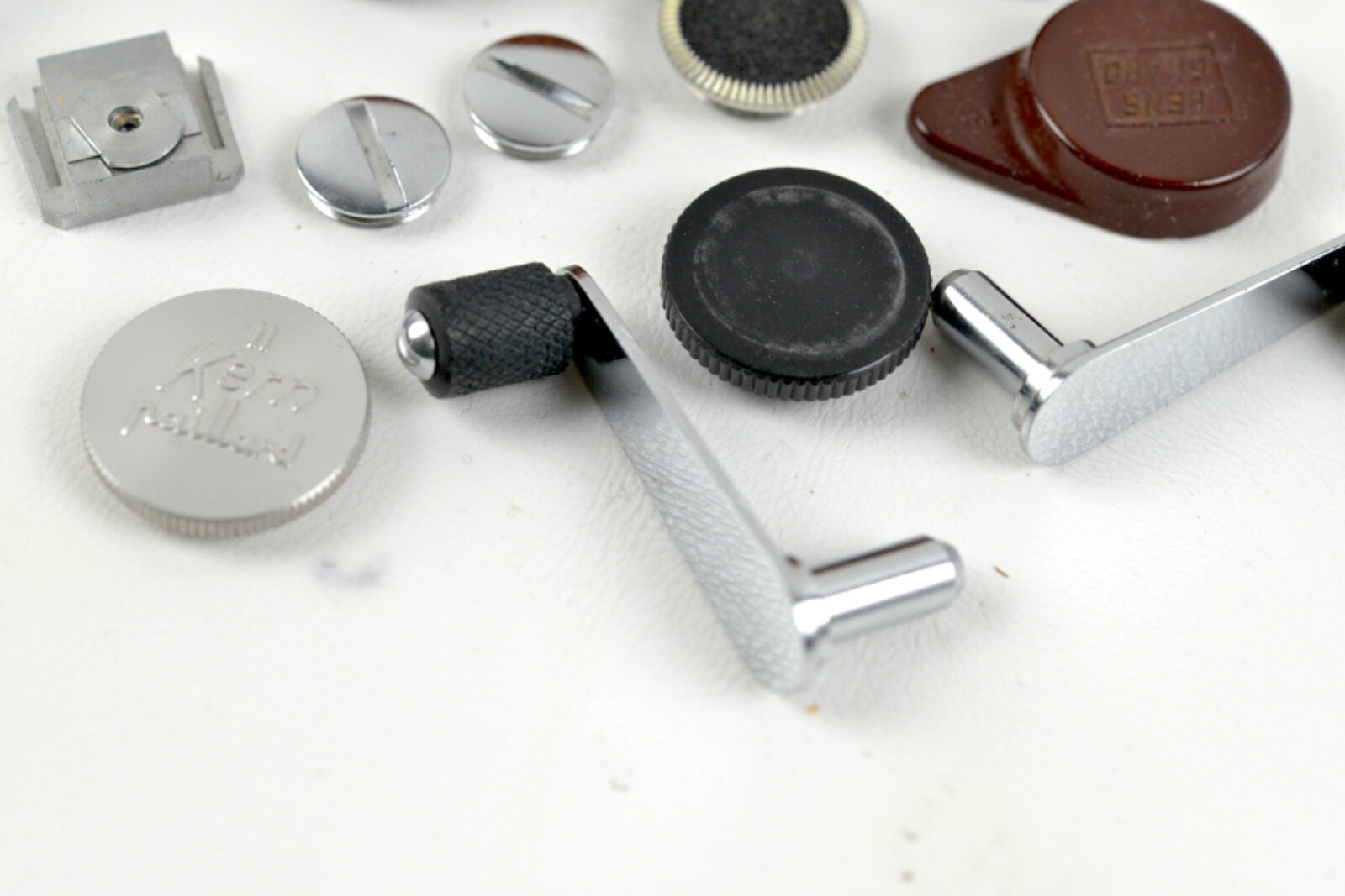 Kern Paillard Cranks, caps parts