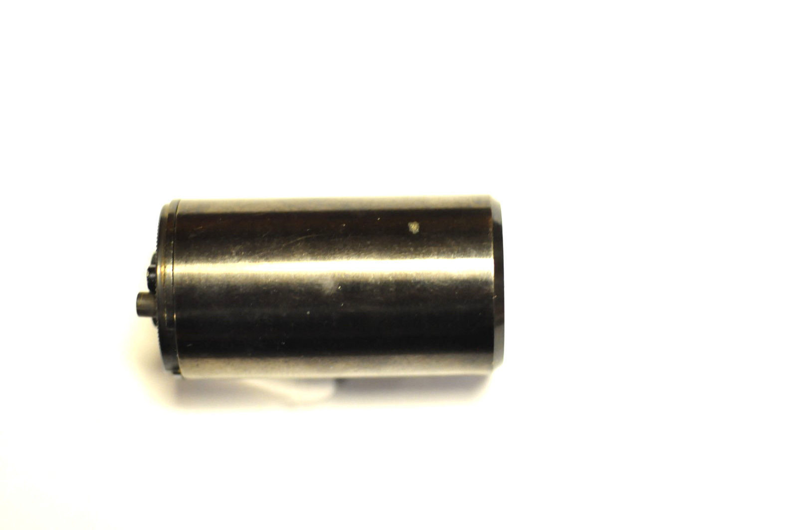 Canon 35mm reloadable film cassette as shown.
