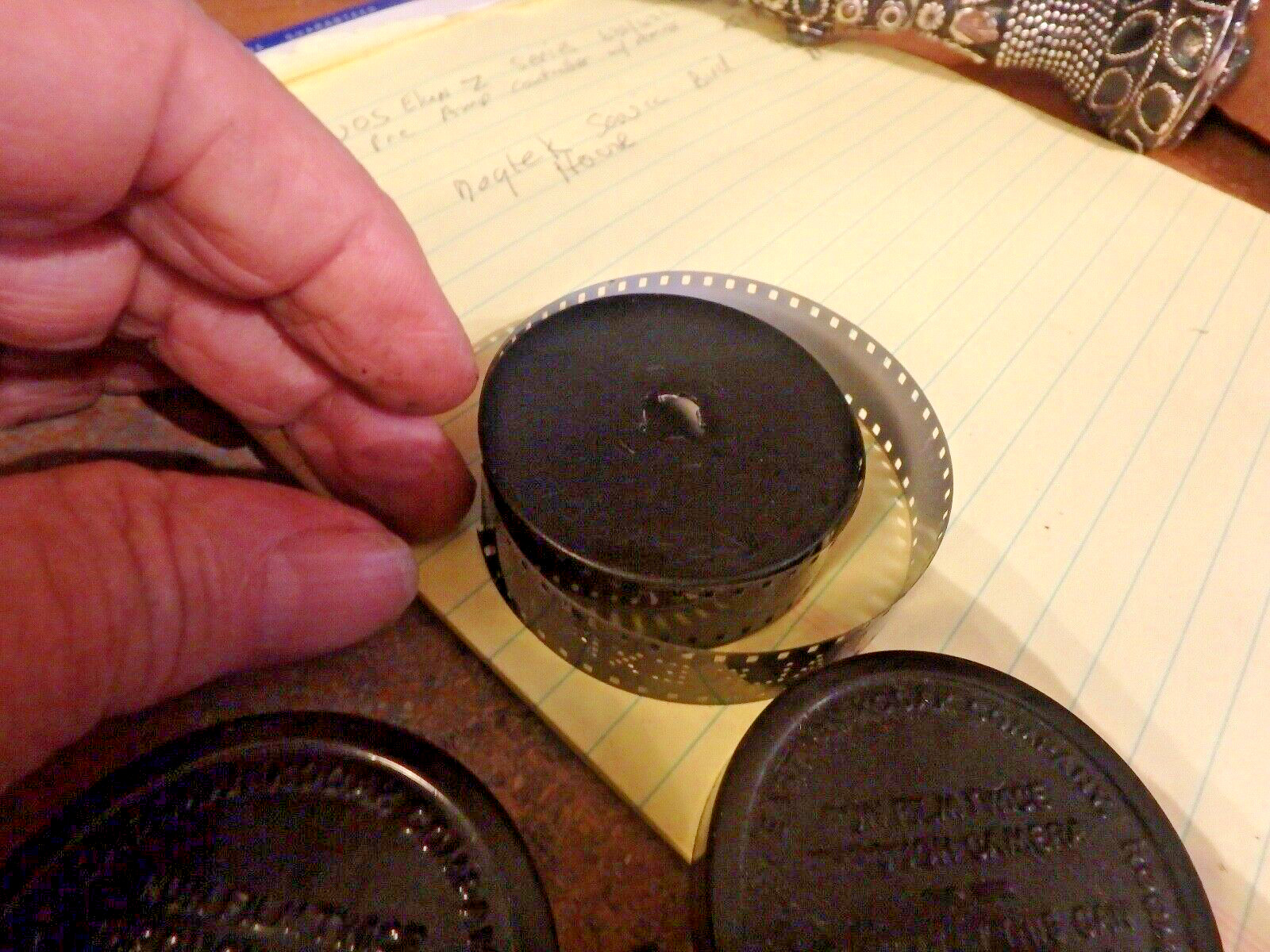 7X-vintage pair KODAK 3″ metal film cannisters -one has a reel of film.i